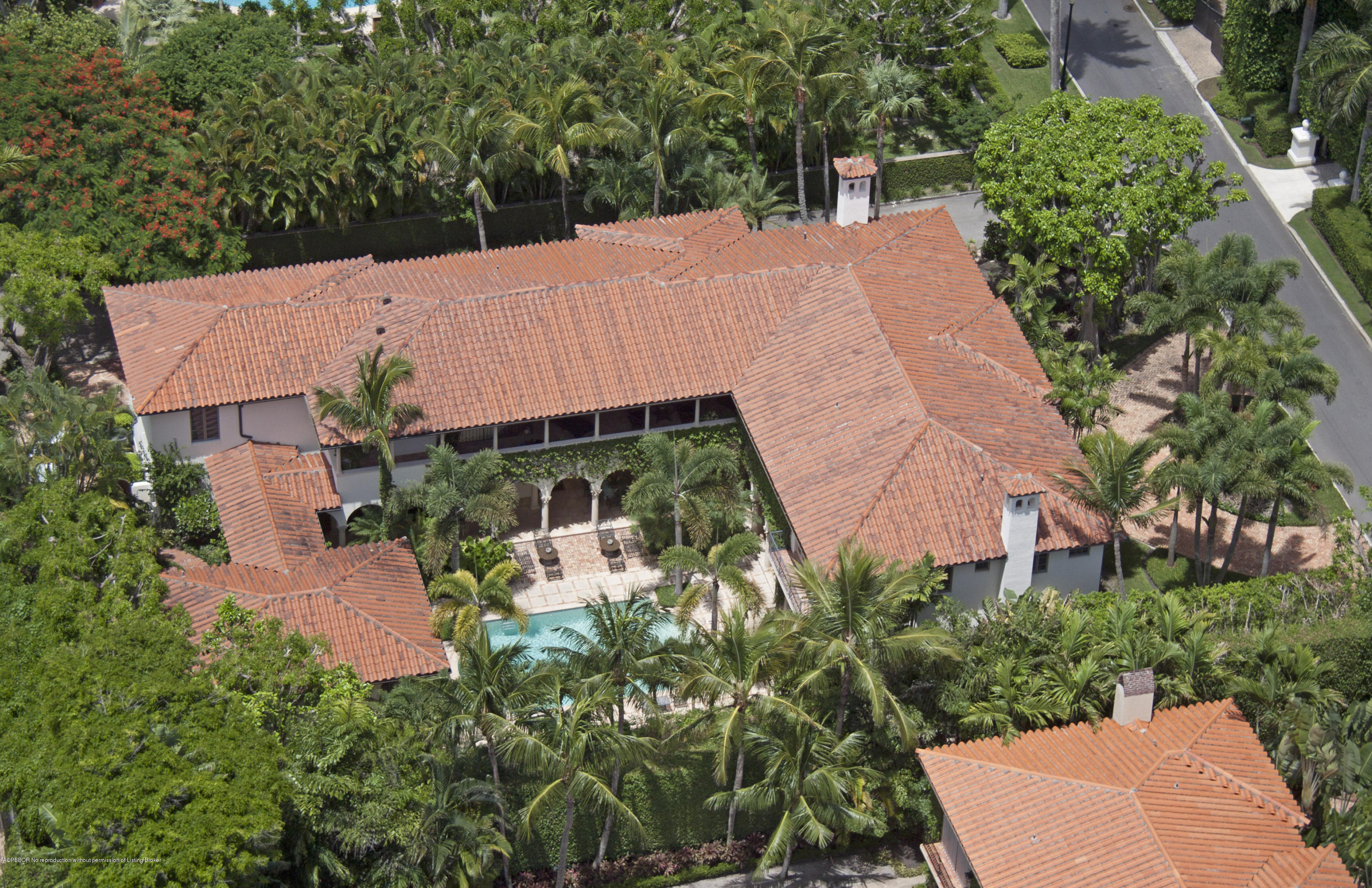 210 El Vedado Road Palm Beach, FL 33480 - Photo 40 of 45 an aerial view of a house with yard and trees all around