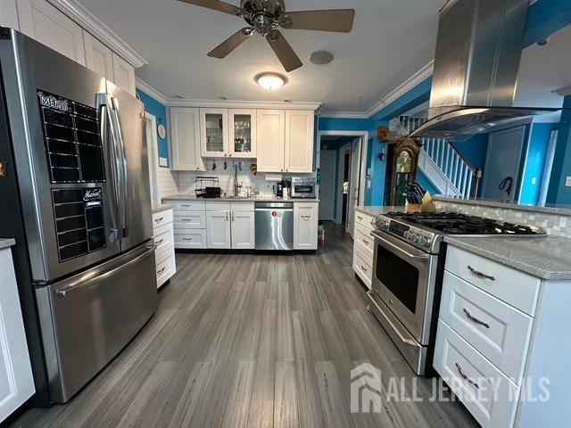 78 Schoder Avenue Woodbridge, NJ 07095 - Photo 12 of 26 a kitchen with stove and refrigerator