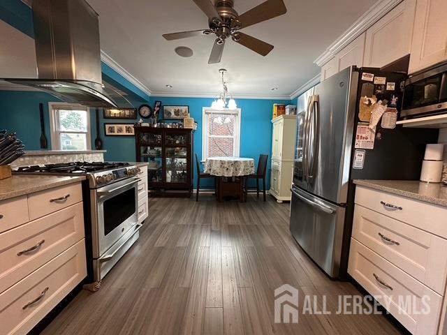 78 Schoder Avenue Woodbridge, NJ 07095 - Photo 14 of 26 a kitchen with stainless steel appliances a stove oven and a refrigerator