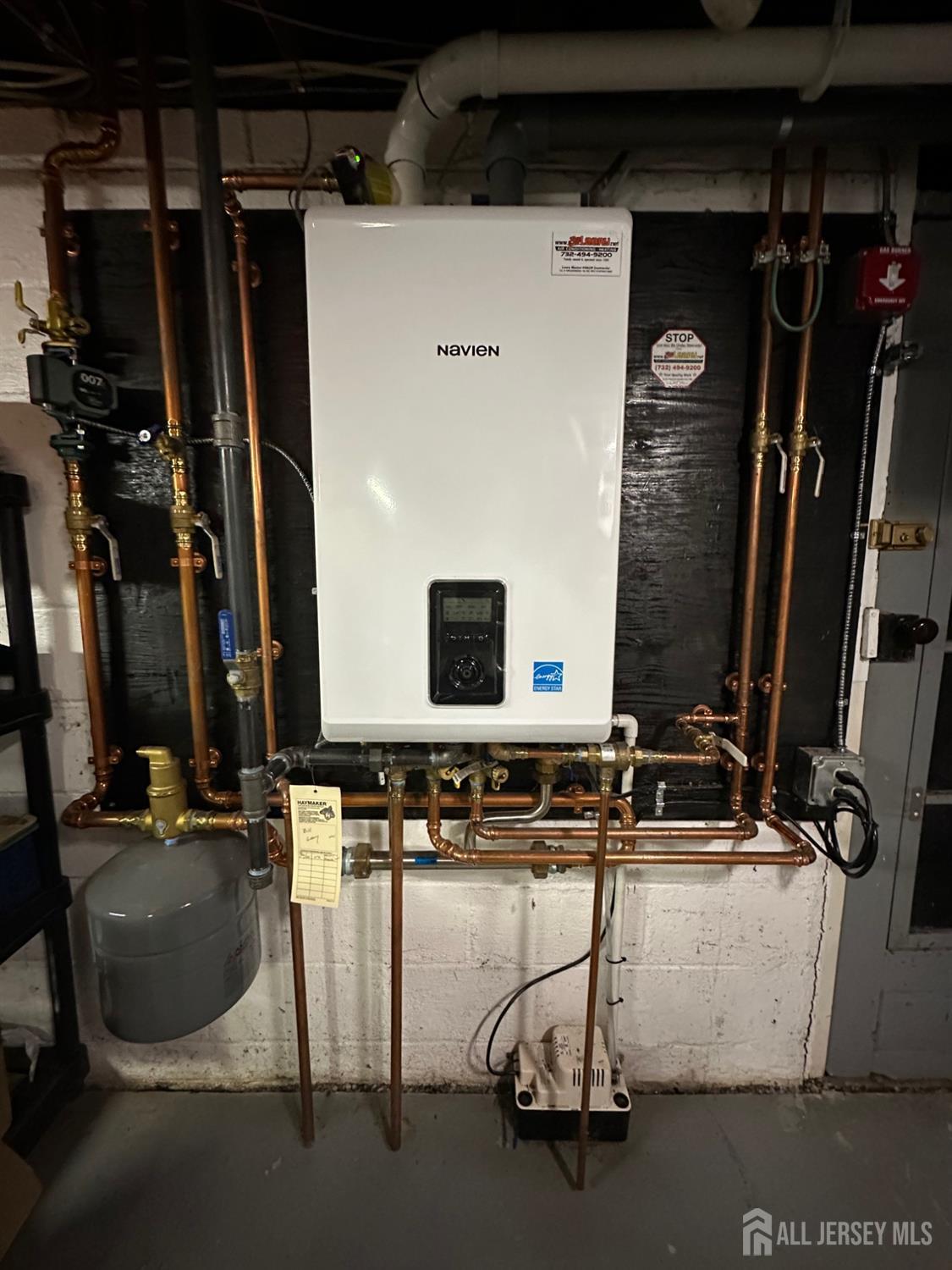 78 Schoder Avenue Woodbridge, NJ 07095 - Photo 26 of 26 a bathroom with a sink and mirror