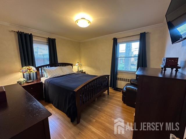 78 Schoder Avenue Woodbridge, NJ 07095 - Photo 6 of 26 a bedroom with bed and window