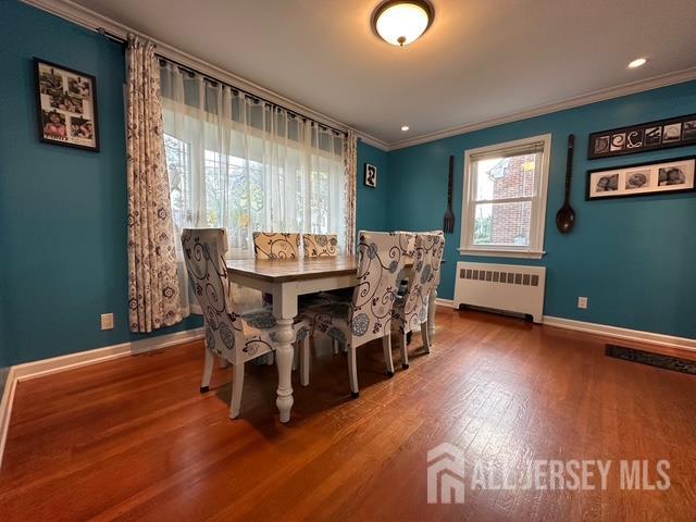 78 Schoder Avenue Woodbridge, NJ 07095 - Photo 8 of 26 a dining room with furniture and wooden floor
