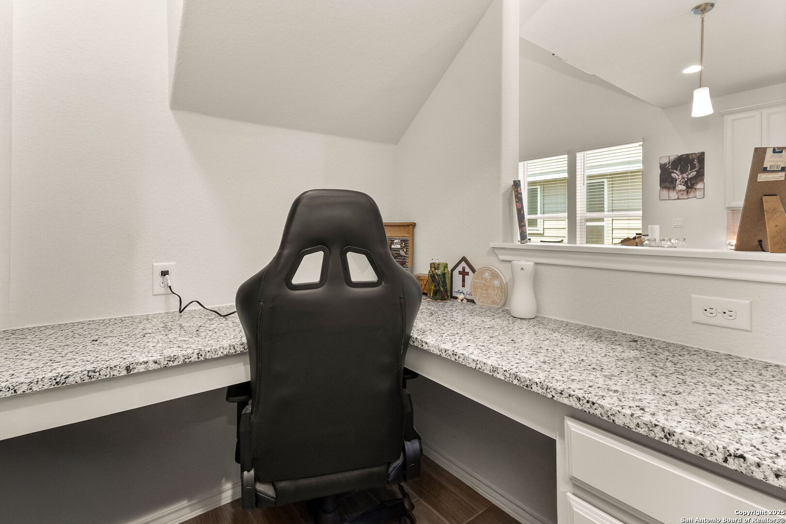 4012 Wild Bloom Road Seguin, TX 78155 - Photo 16 of 26 a bathroom with a granite countertop sink and vanity