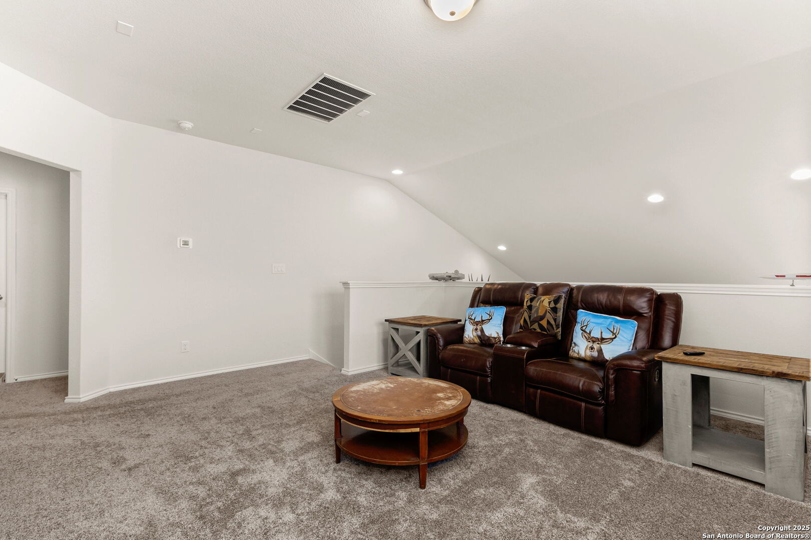 4012 Wild Bloom Road Seguin, TX 78155 - Photo 19 of 26 a living room with furniture and a wooden floor