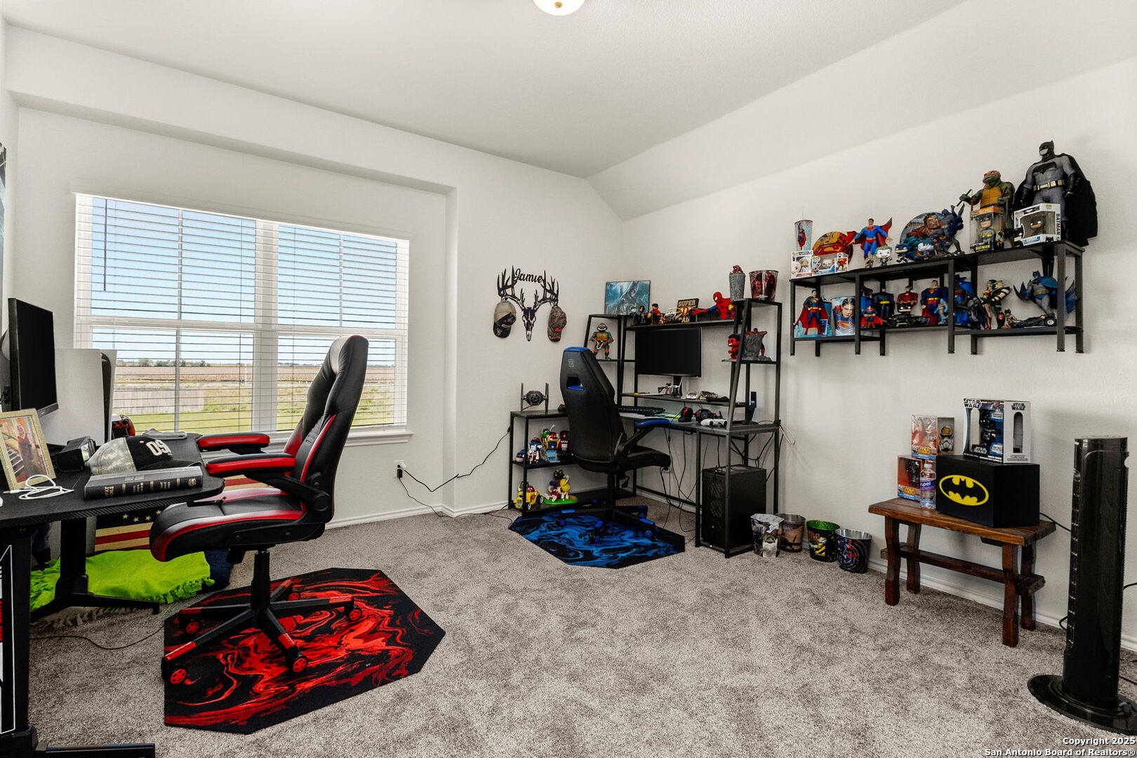 4012 Wild Bloom Road Seguin, TX 78155 - Photo 20 of 26 a view of a workspace with furniture and a window