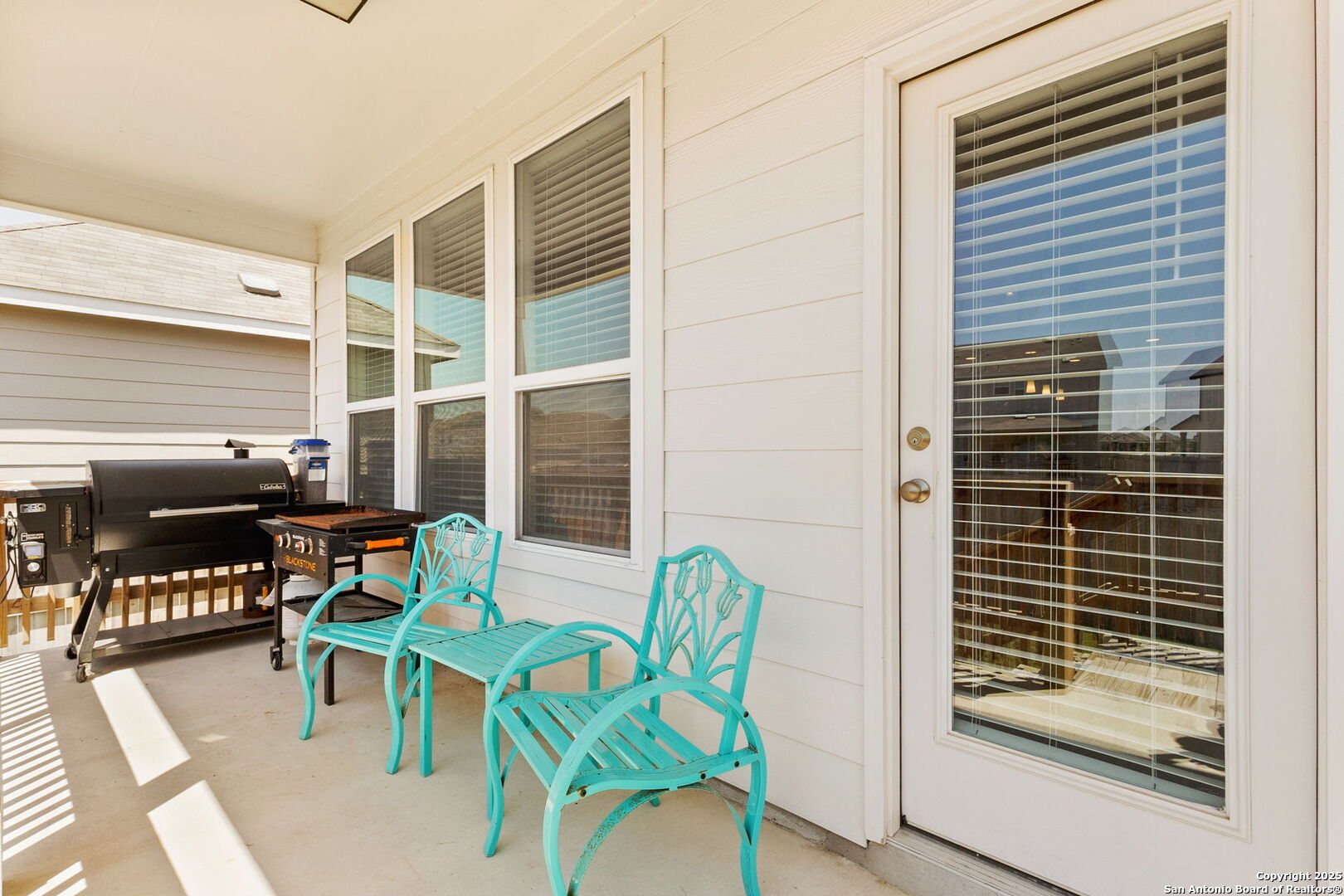 4012 Wild Bloom Road Seguin, TX 78155 - Photo 24 of 26 a two chairs sitting in front of a house