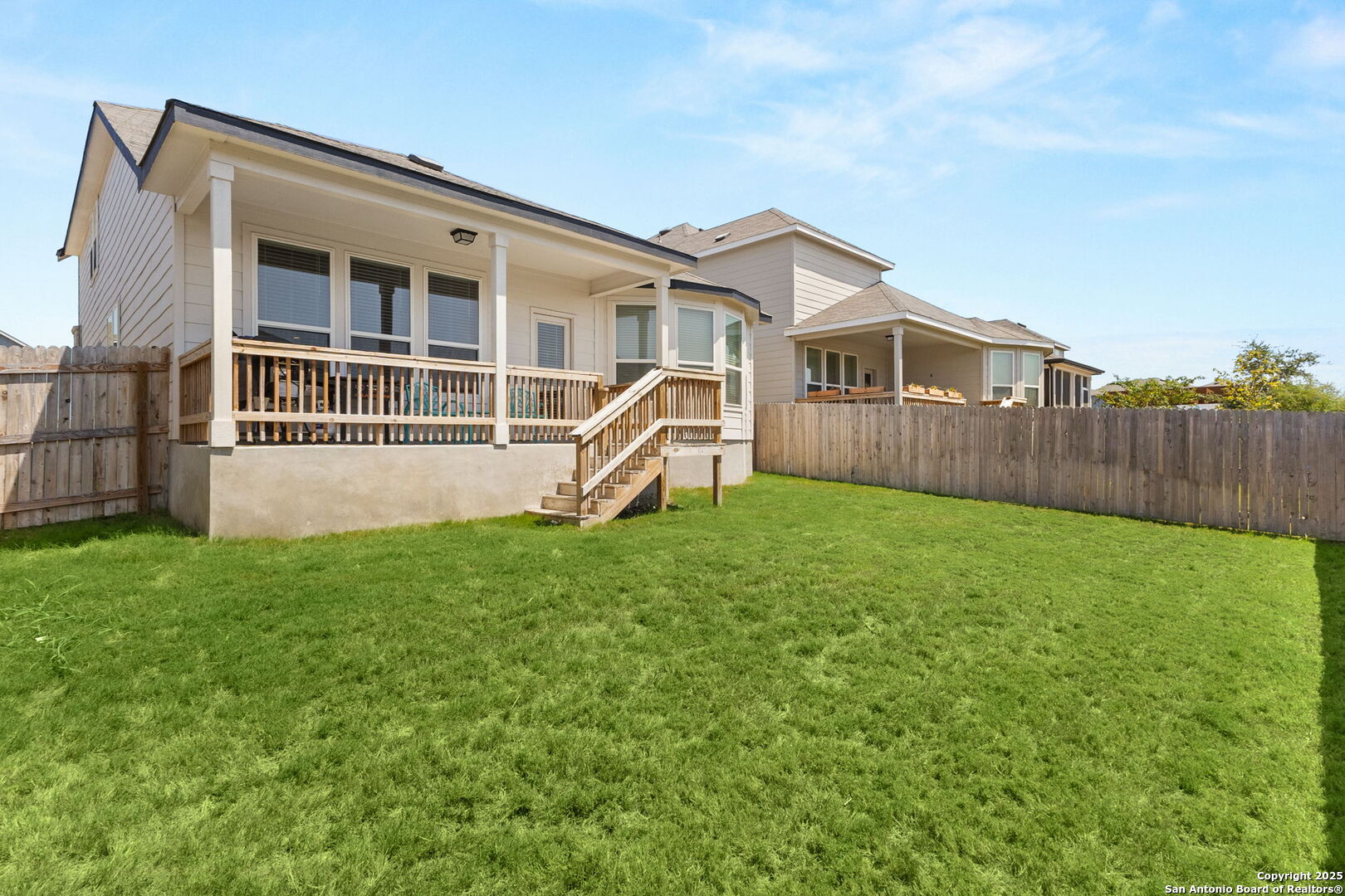 4012 Wild Bloom Road Seguin, TX 78155 - Photo 26 of 26 a view of a house with backyard and a garden