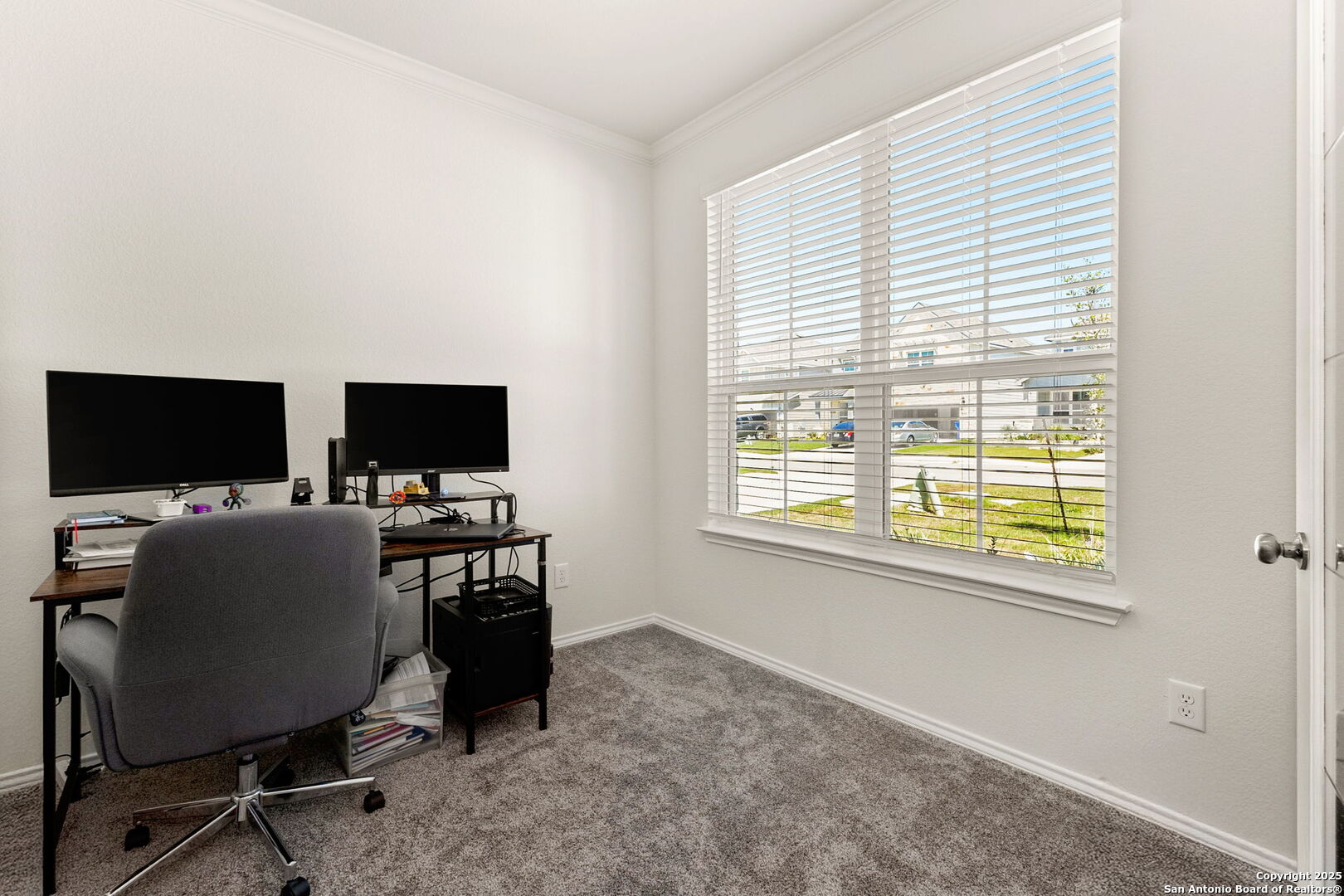 4012 Wild Bloom Road Seguin, TX 78155 - Photo 9 of 26 a view of a livingroom with workspace and a window