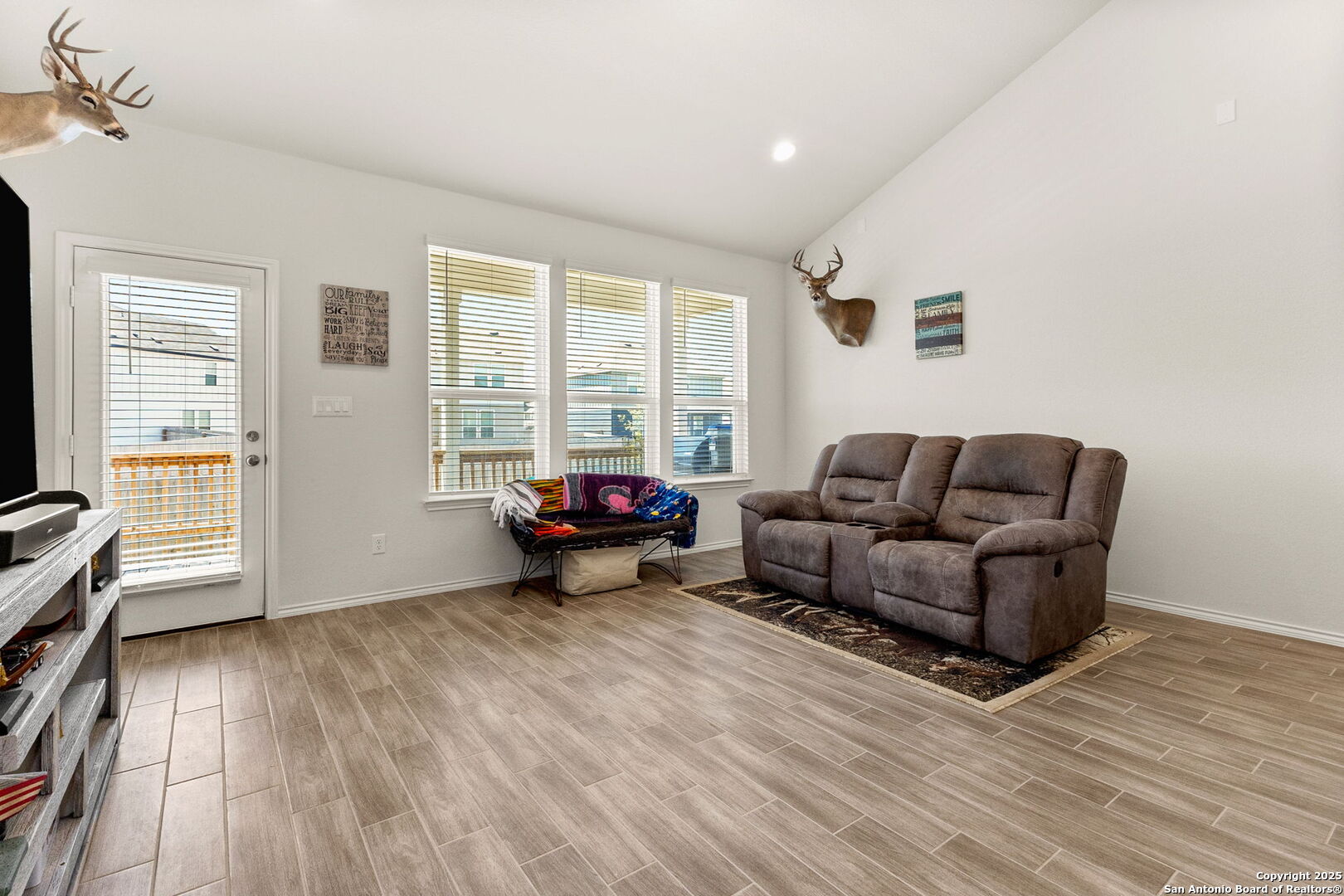 4012 Wild Bloom Road Seguin, TX 78155 - Photo 10 of 26 a living room with furniture and a window