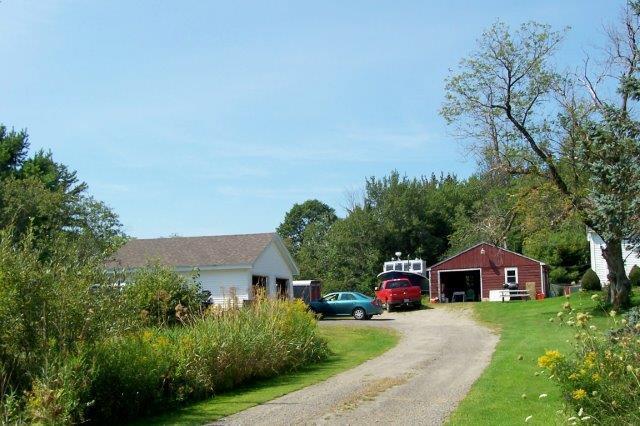 239 Pleasant Point Road Cushing, ME 04563 - Photo 5 of 18 Driveway with 2-car garage to left...