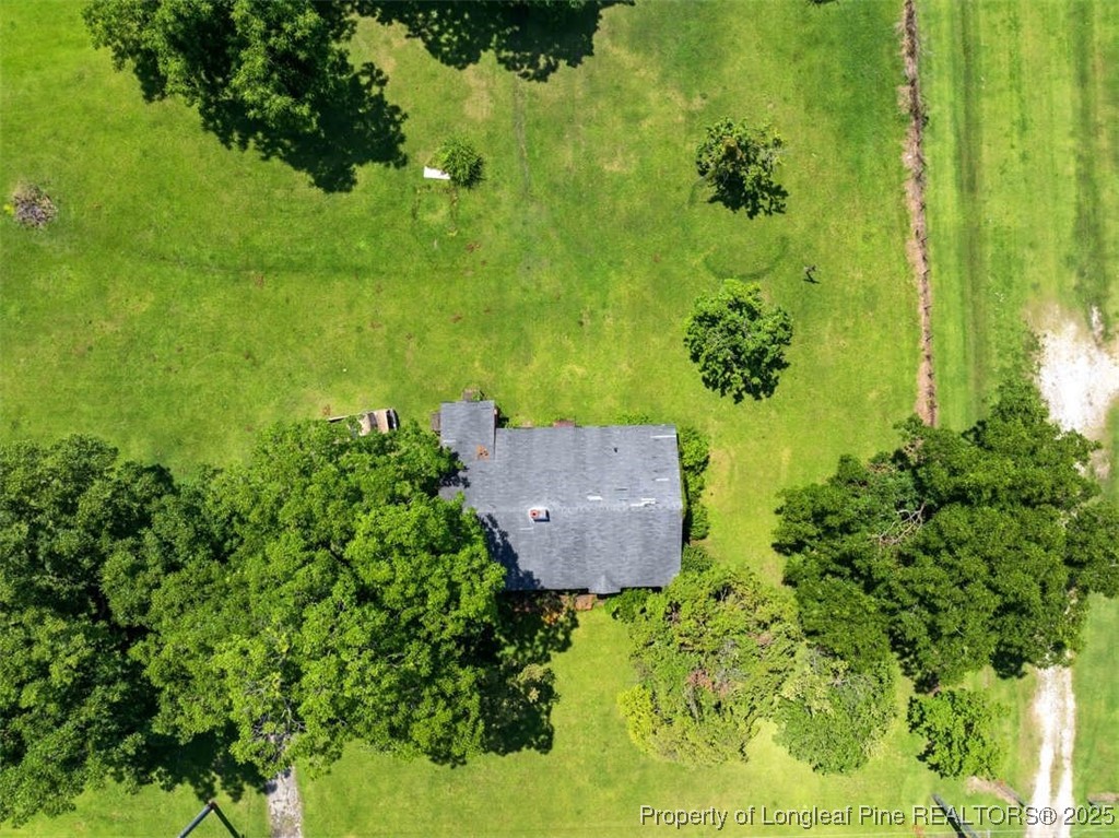 4247 River Road Wade, NC 28395 - Photo 11 of 17 a view of a garden