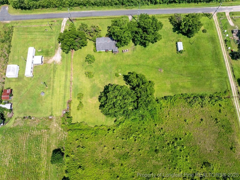 4247 River Road Wade, NC 28395 - Photo 12 of 17 a view of a garden