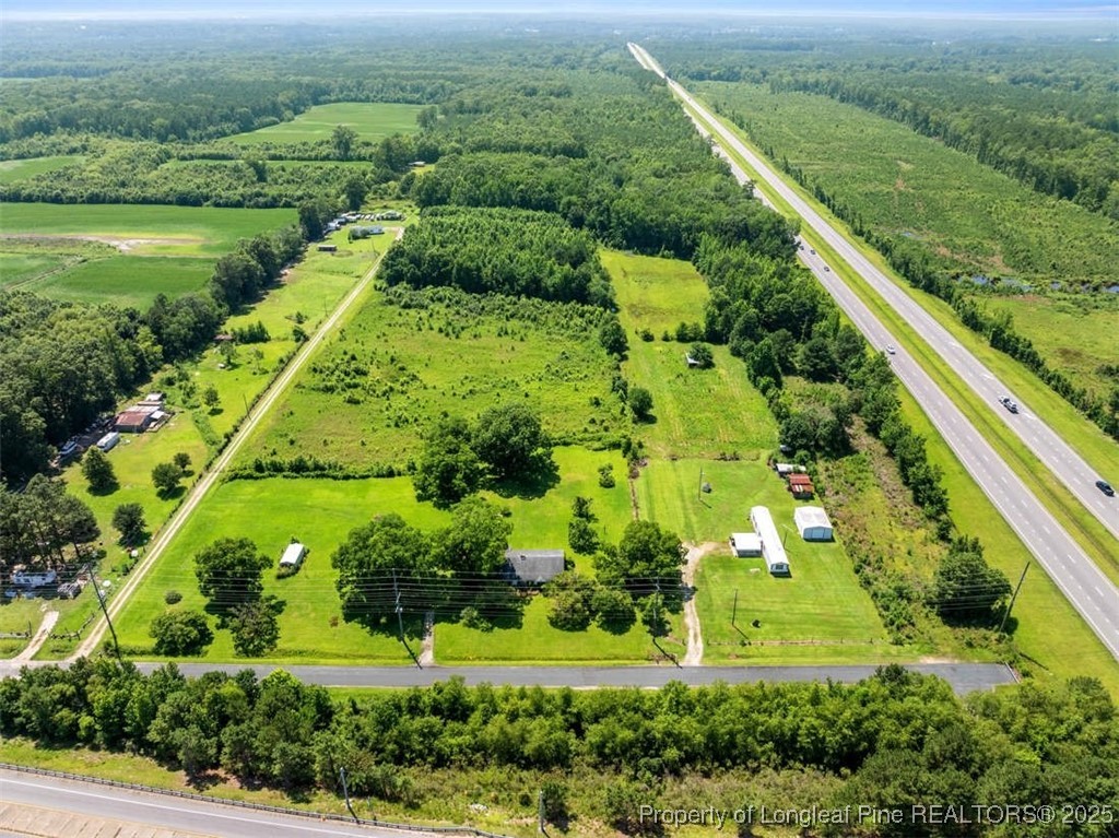 4247 River Road Wade, NC 28395 - Photo 8 of 17 an aerial view of a houses with outdoor space