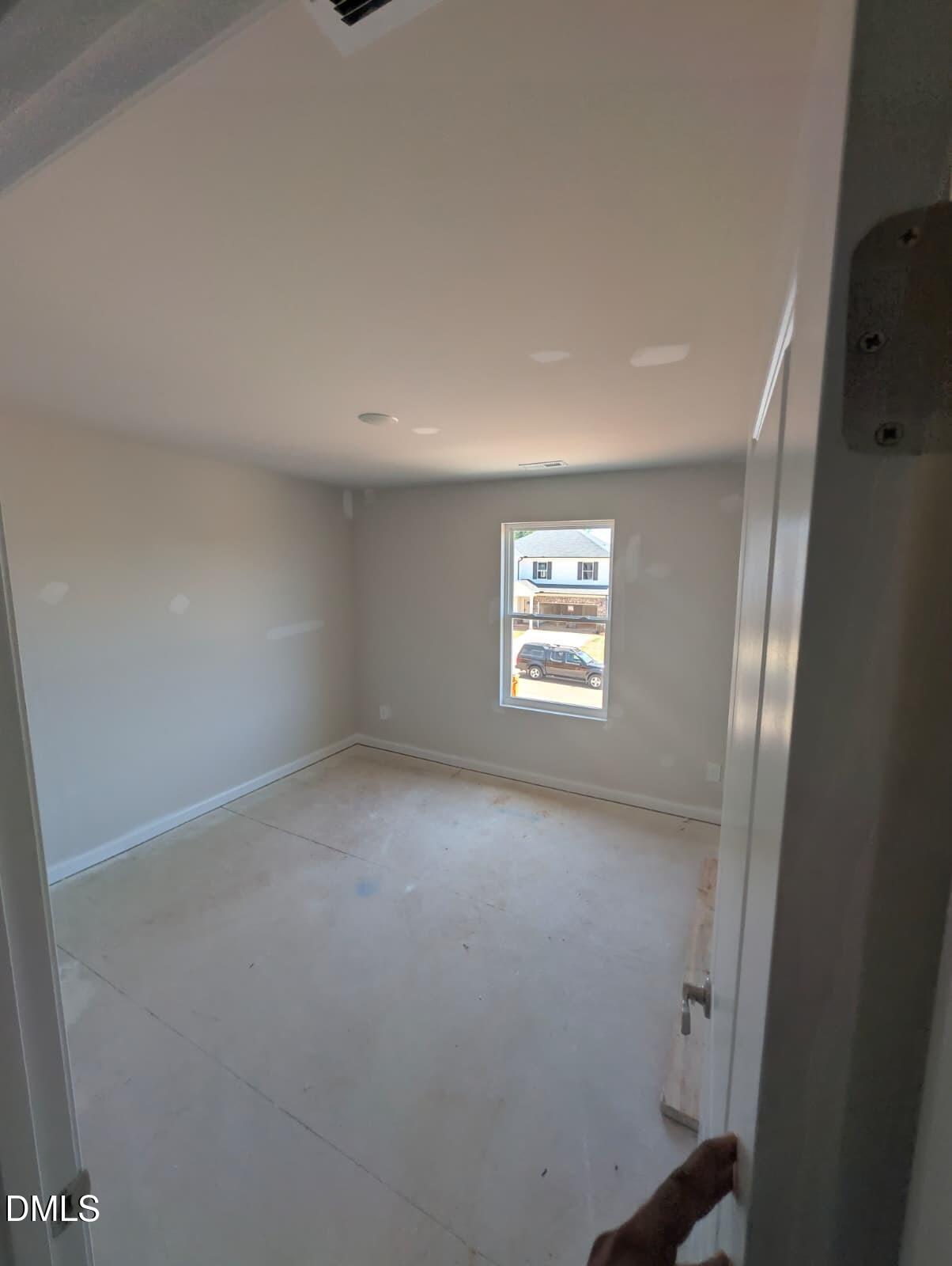 308 Karlov Road Garner, NC 27529 - Photo 20 of 55 an empty room with windows