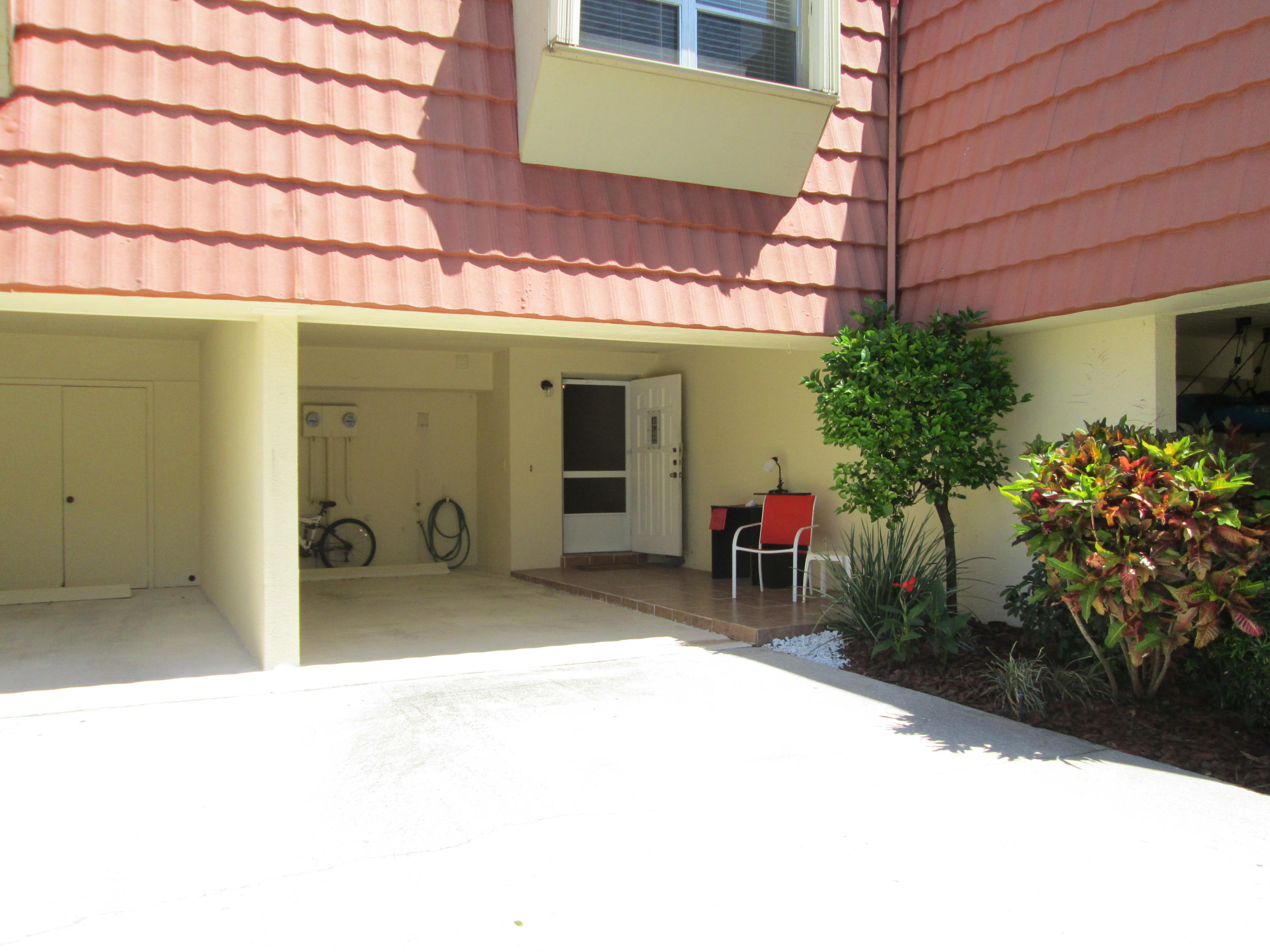 388 Golfview Road, Unit C North Palm Beach, FL 33408 - Photo 2 of 16 a view of a room with a patio