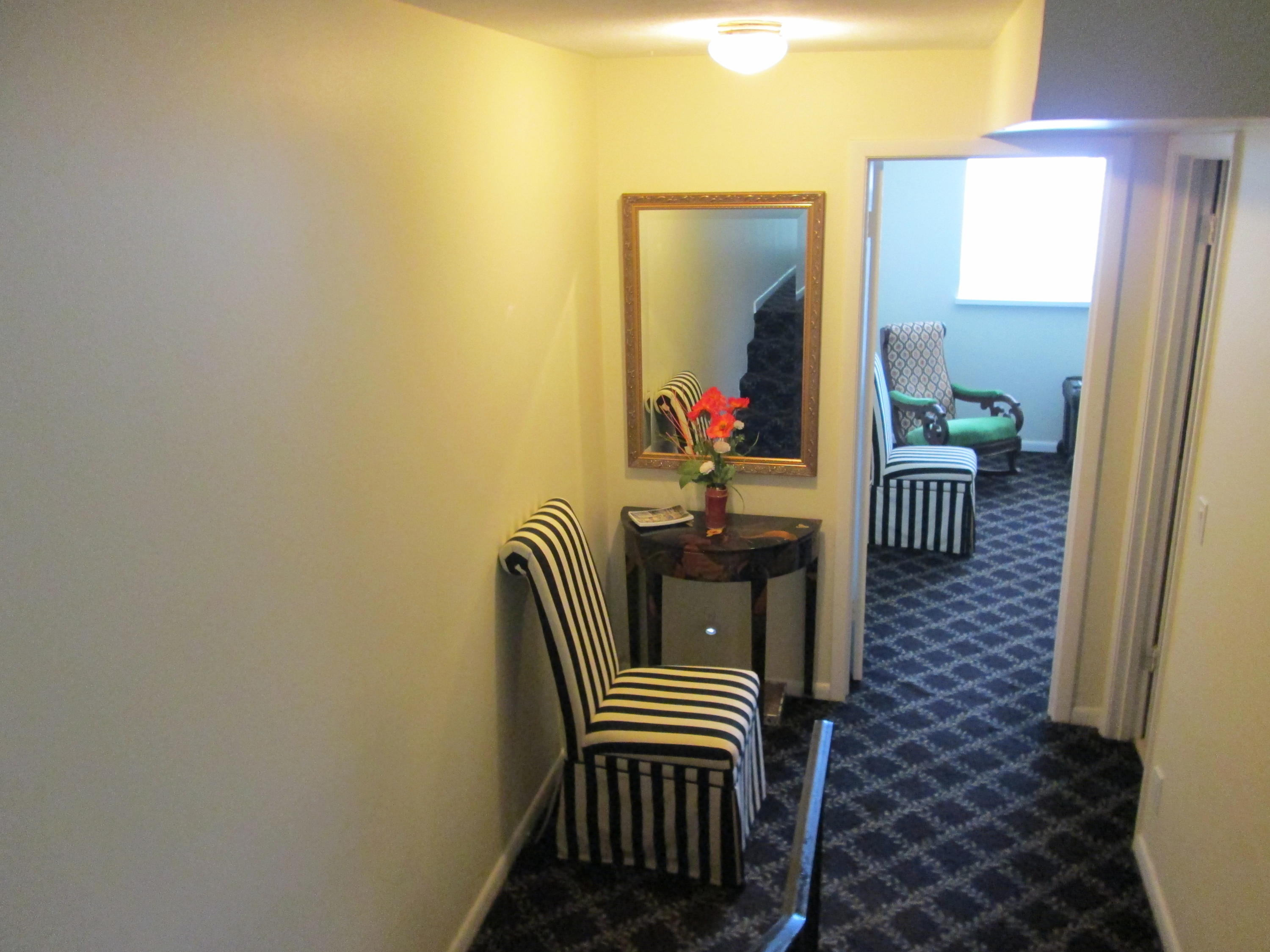 388 Golfview Road, Unit C North Palm Beach, FL 33408 - Photo 7 of 16 a balcony with two chairs and a potted plant