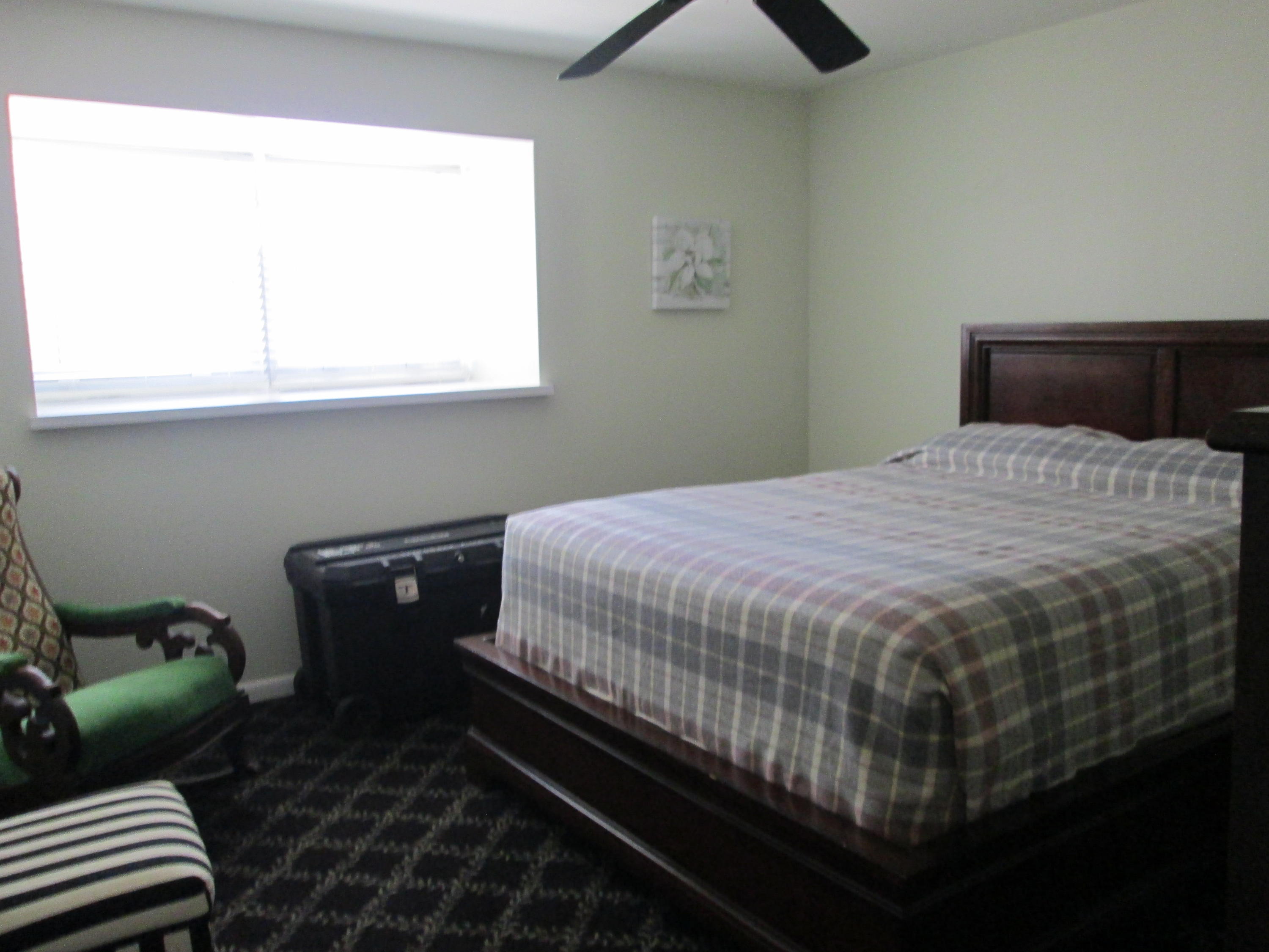 388 Golfview Road, Unit C North Palm Beach, FL 33408 - Photo 8 of 16 a bedroom with a bed and a window