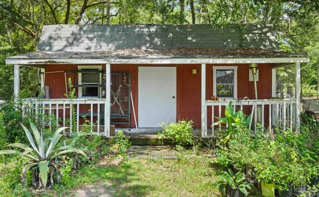 front view of house with a small yard