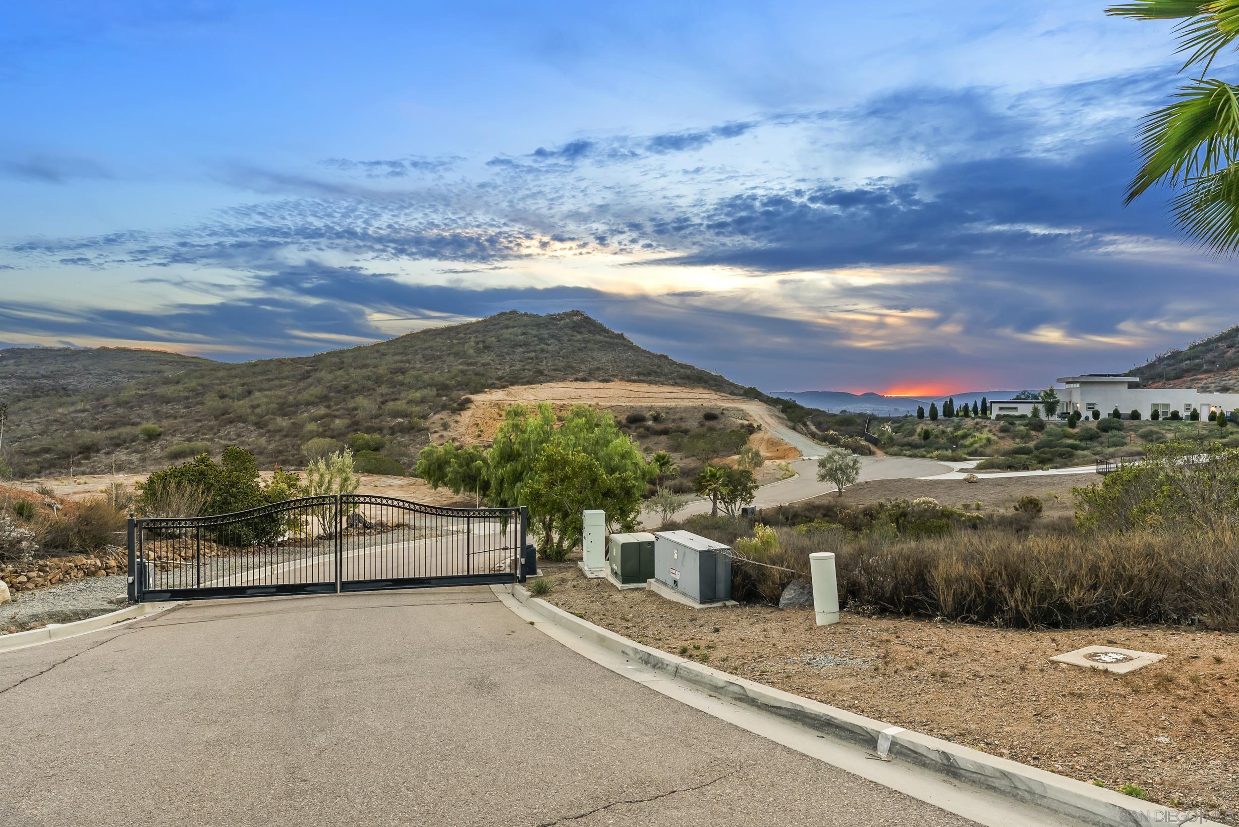 15003 Tooth Rock Road Poway, CA 92064 - Photo 3 of 9 a view of a lake with a mountain