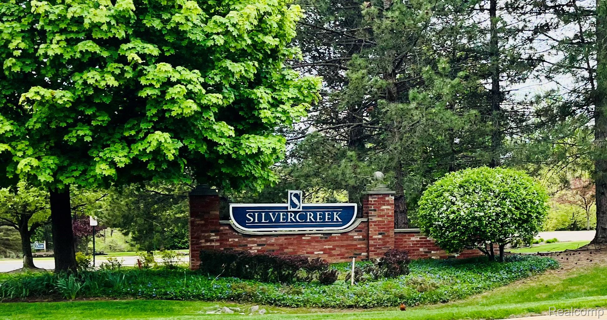 3624 Oakmonte Boulevard, Unit 82 Rochester, MI 48306 - Photo 35 of 37 View of community / neighborhood sign