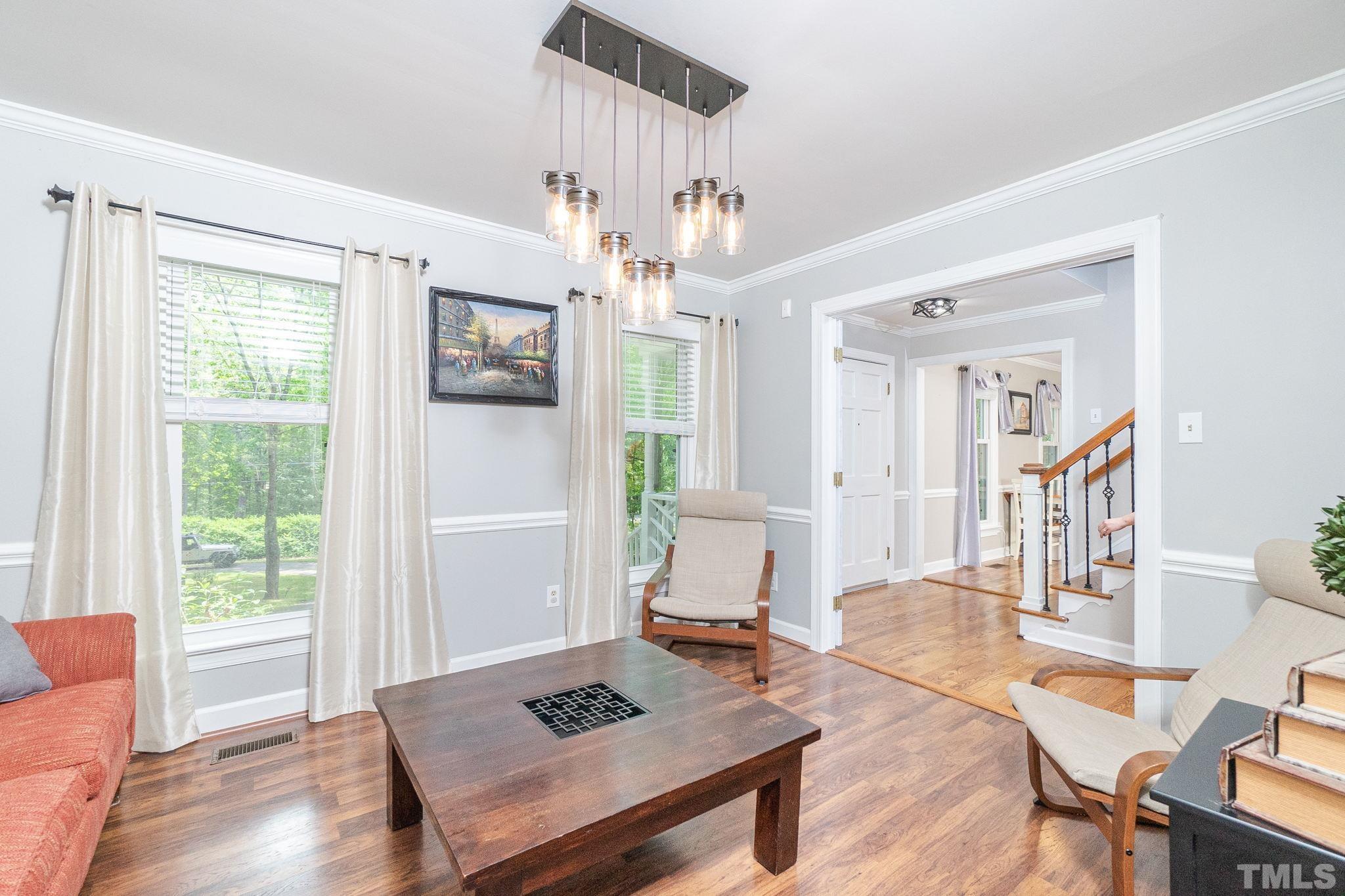 6313 Craig Road Durham, NC 27712 - Photo 9 of 38 a living room with furniture and a window