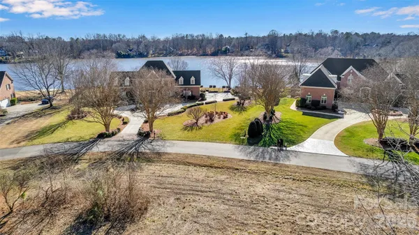 an aerial view of a house with swimming pool
