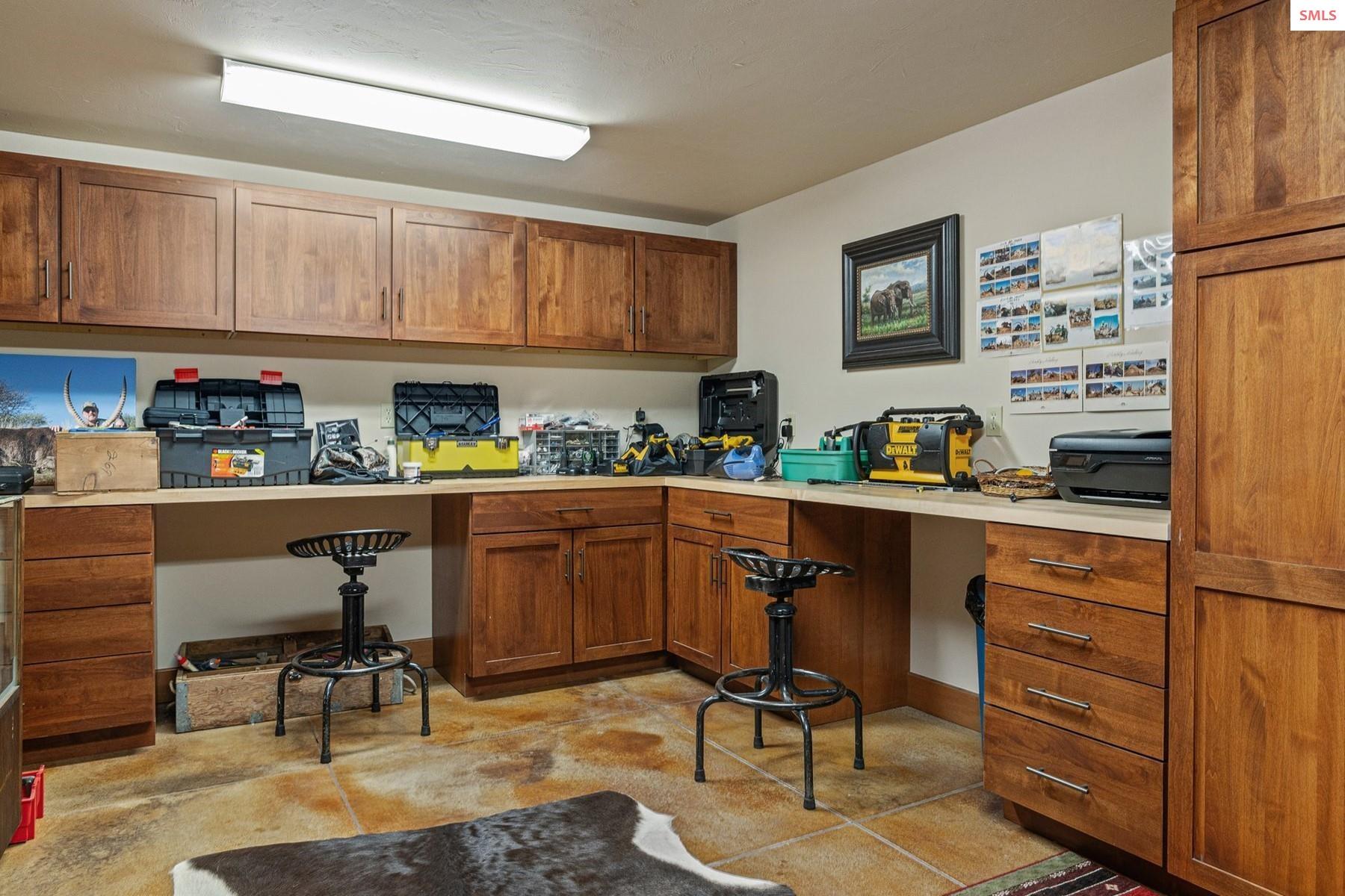 526 Roop Road Cocolalla, ID 83813 - Photo 49 of 100 Custom work area downstairs with lots of storage