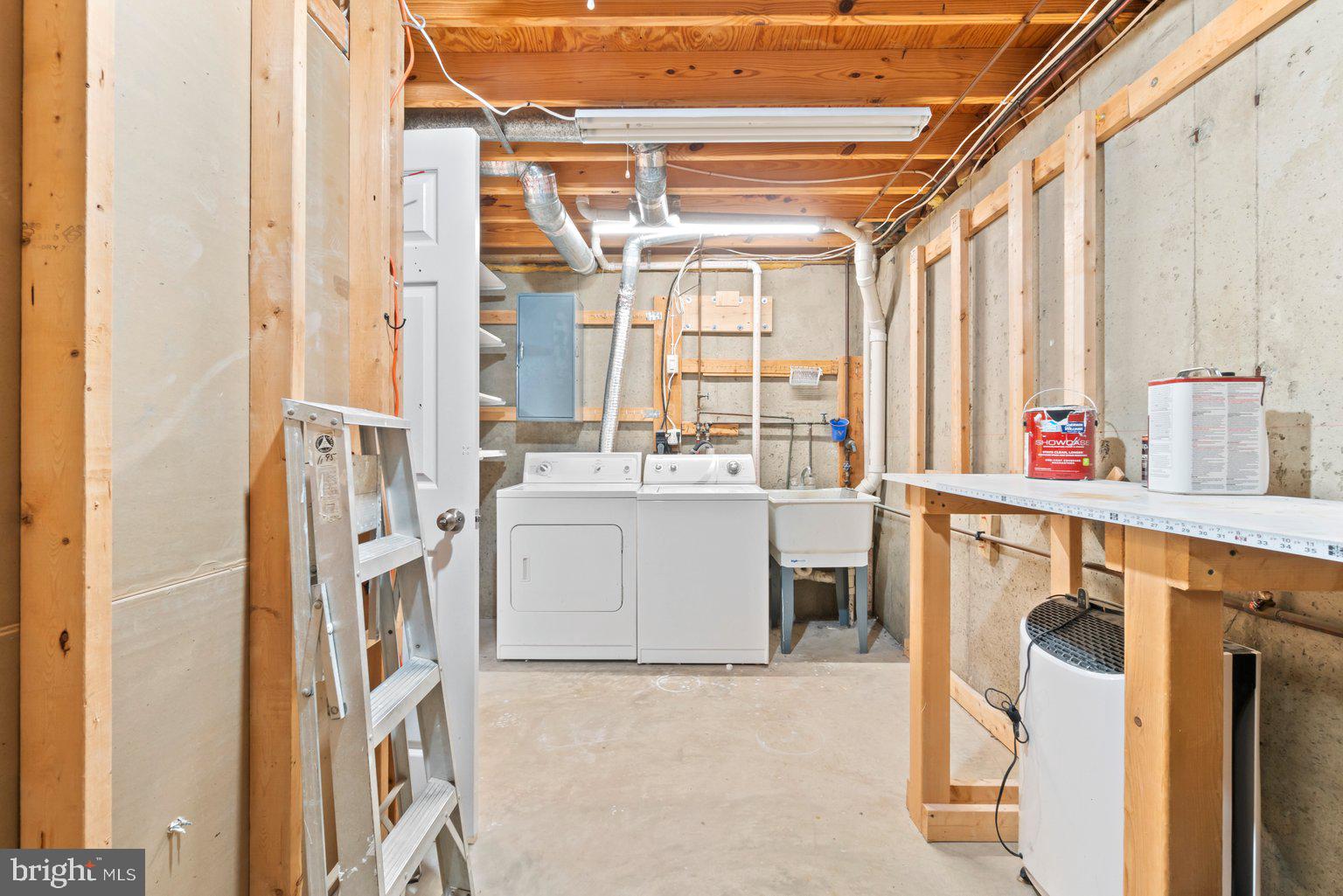 1151 Ingate Road Baltimore, MD 21227 - Photo 22 of 30 Large laundry area, ideal for storage items