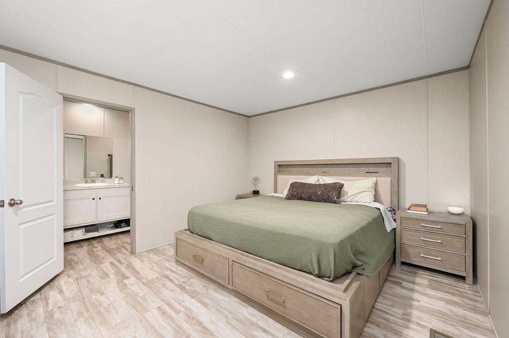271 Clements Way Fruita, CO 81521 - Photo 10 of 26 a bedroom with a bed and a view of bedroom