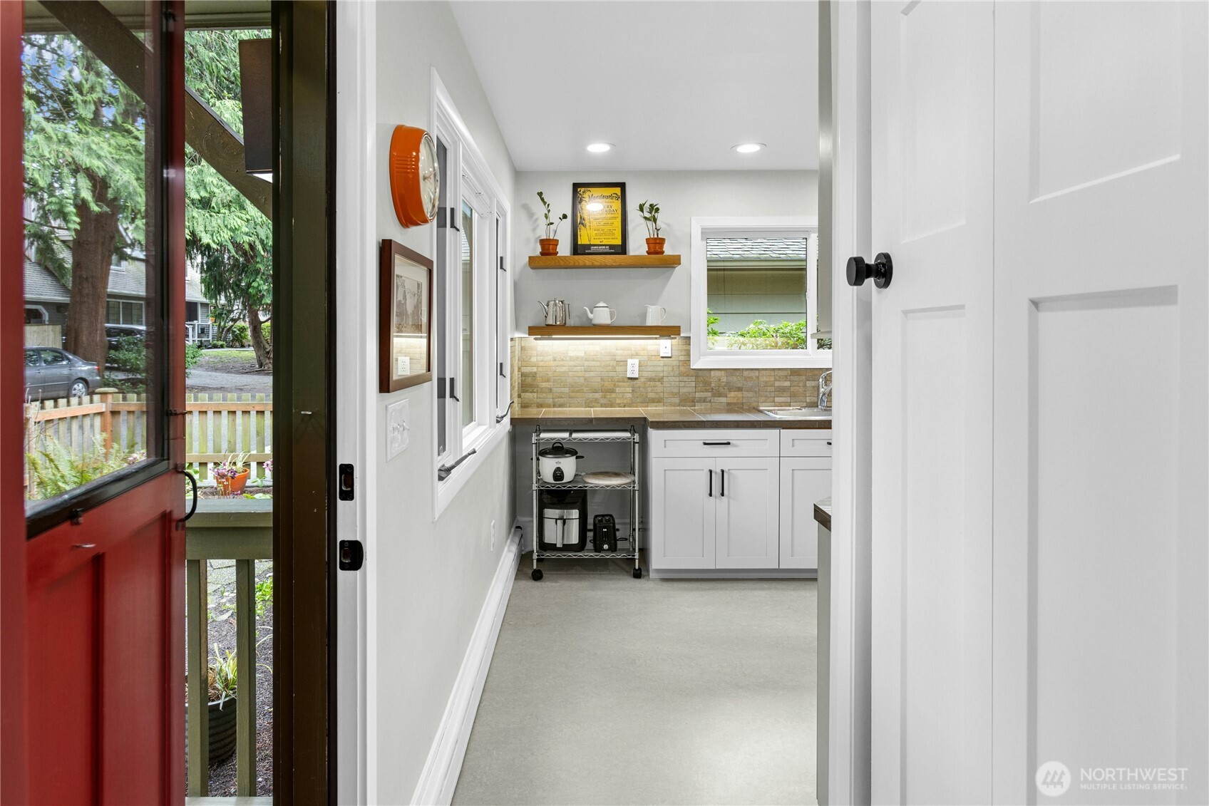21214 96th Avenue West Edmonds, WA 98020 - Photo 15 of 40 a kitchen with a refrigerator and a sink