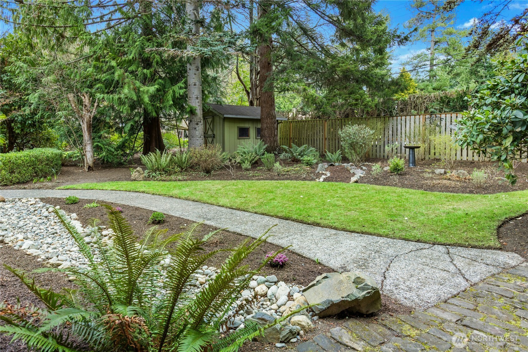 21214 96th Avenue West Edmonds, WA 98020 - Photo 19 of 40 a front view of a house with garden