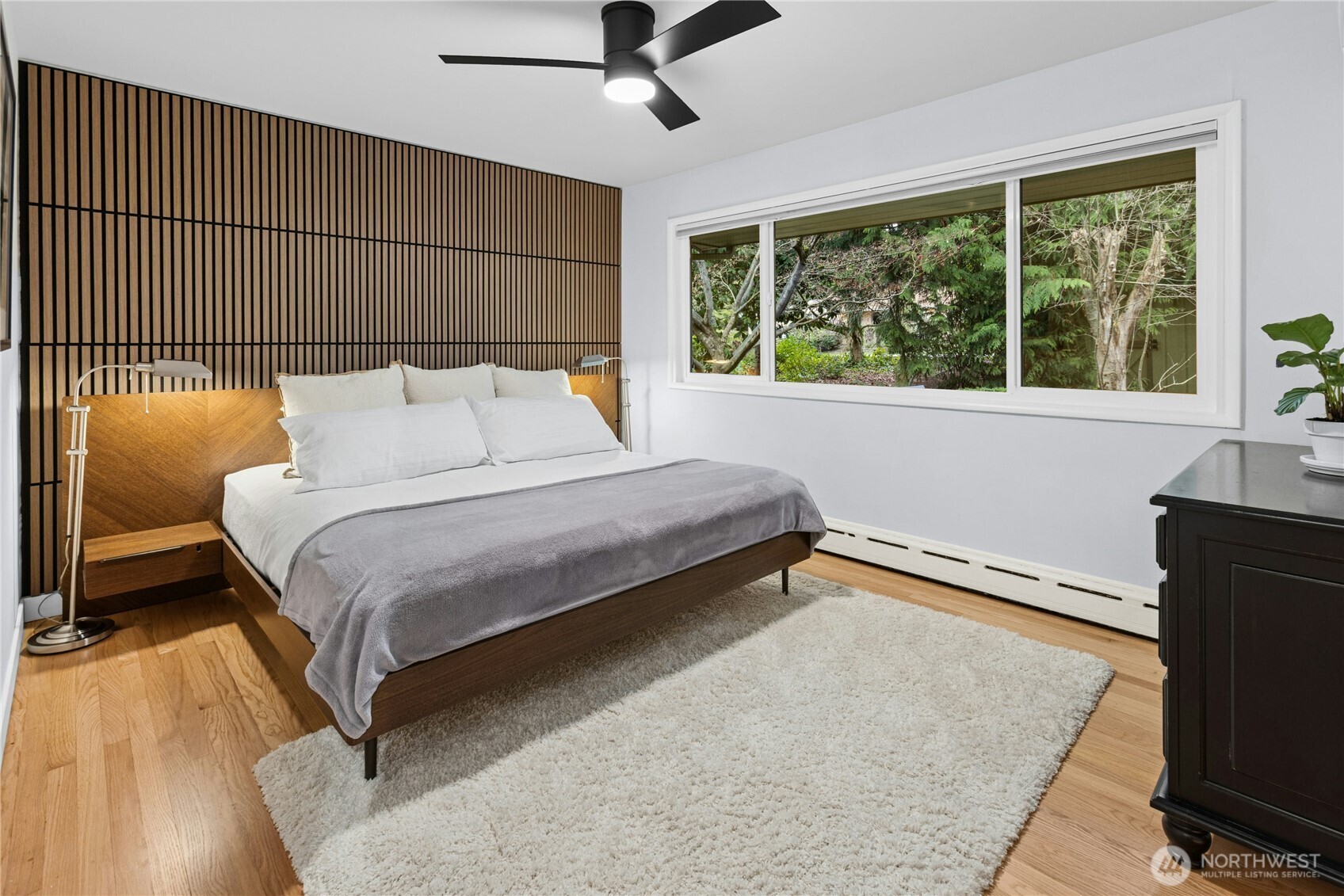 21214 96th Avenue West Edmonds, WA 98020 - Photo 21 of 40 a bedroom with a bed and a large window