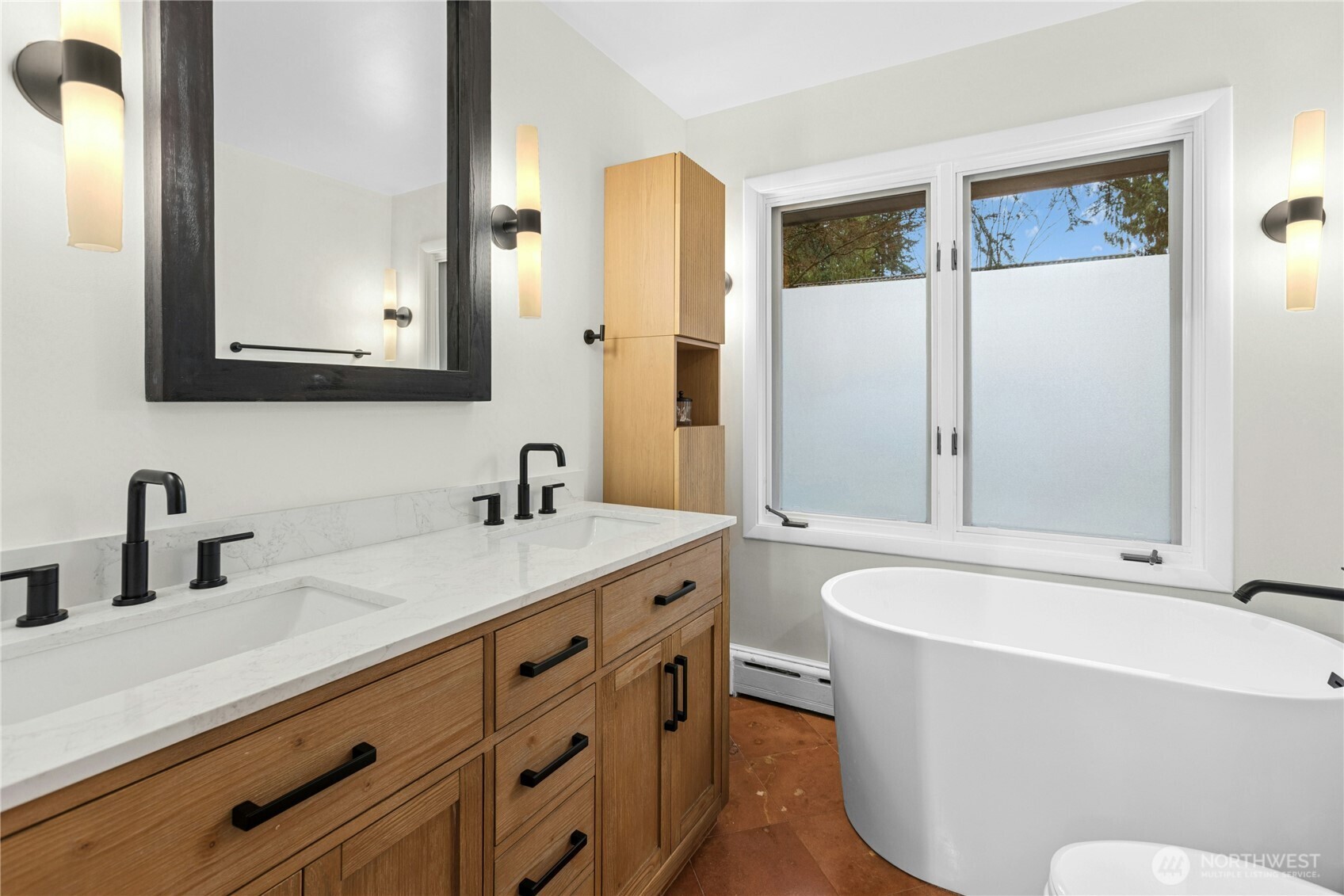 21214 96th Avenue West Edmonds, WA 98020 - Photo 24 of 40 a bathroom with a bathtub and a sink