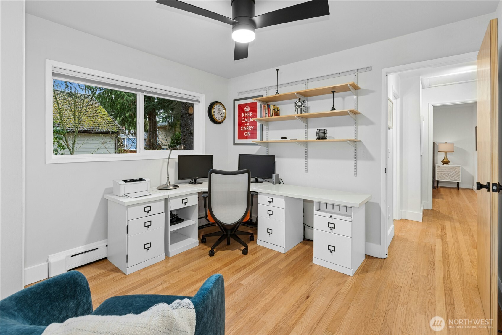 21214 96th Avenue West Edmonds, WA 98020 - Photo 30 of 40 a view of a workspace with furniture and a bedroom