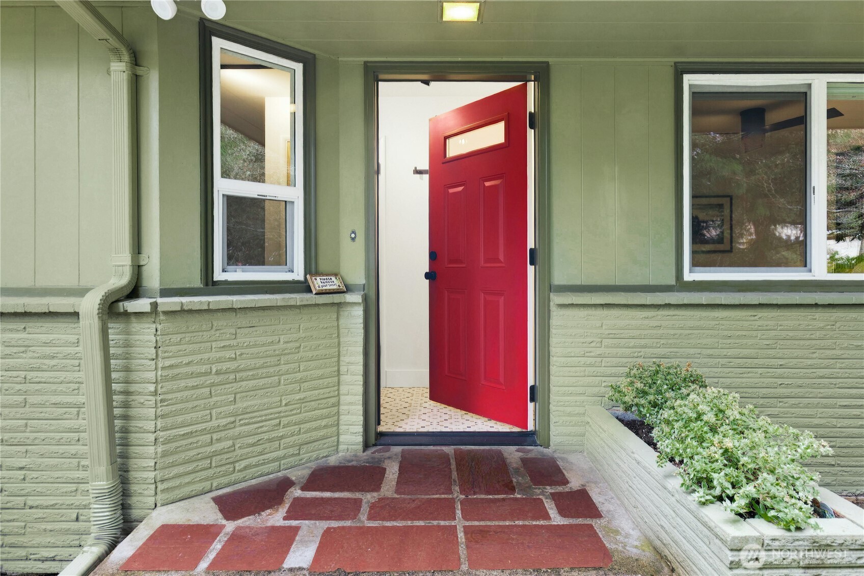 21214 96th Avenue West Edmonds, WA 98020 - Photo 3 of 40 a view of a door with a yard