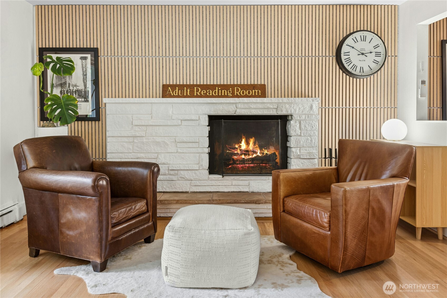 21214 96th Avenue West Edmonds, WA 98020 - Photo 7 of 40 a living room with furniture and a fireplace