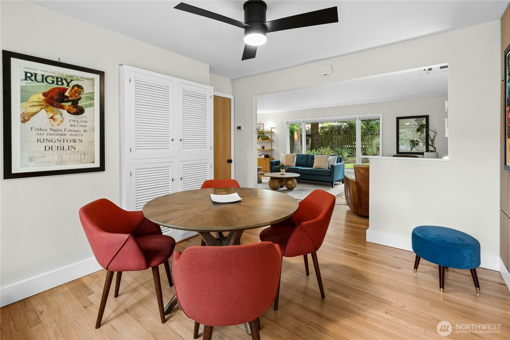 21214 96th Avenue West Edmonds, WA 98020 - Photo 9 of 40 a view of a dining room with furniture a rug and wooden floor