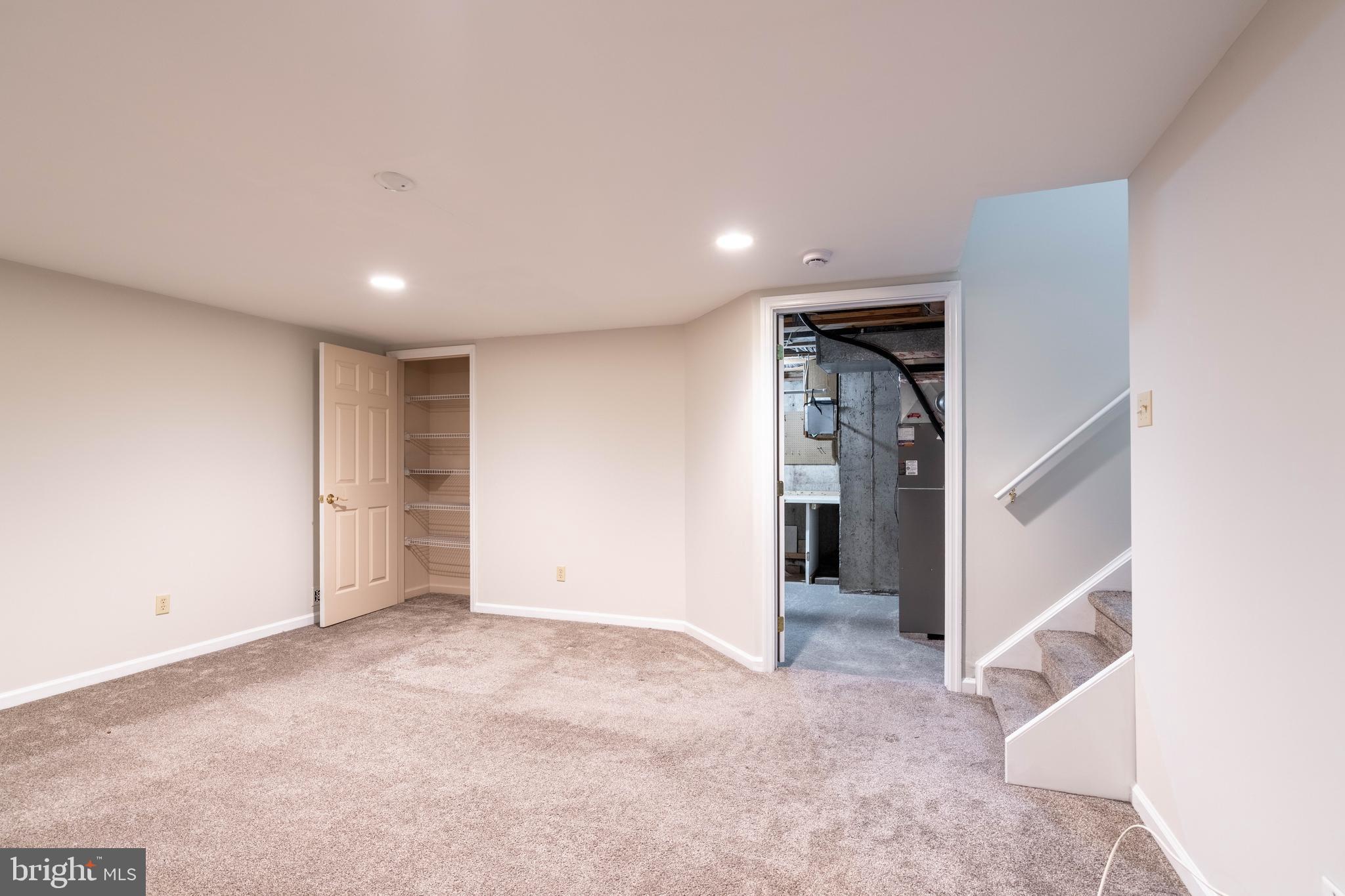 2420 Dogleg Drive Warrington, PA 18976 - Photo 24 of 28 an empty room with closet and windows