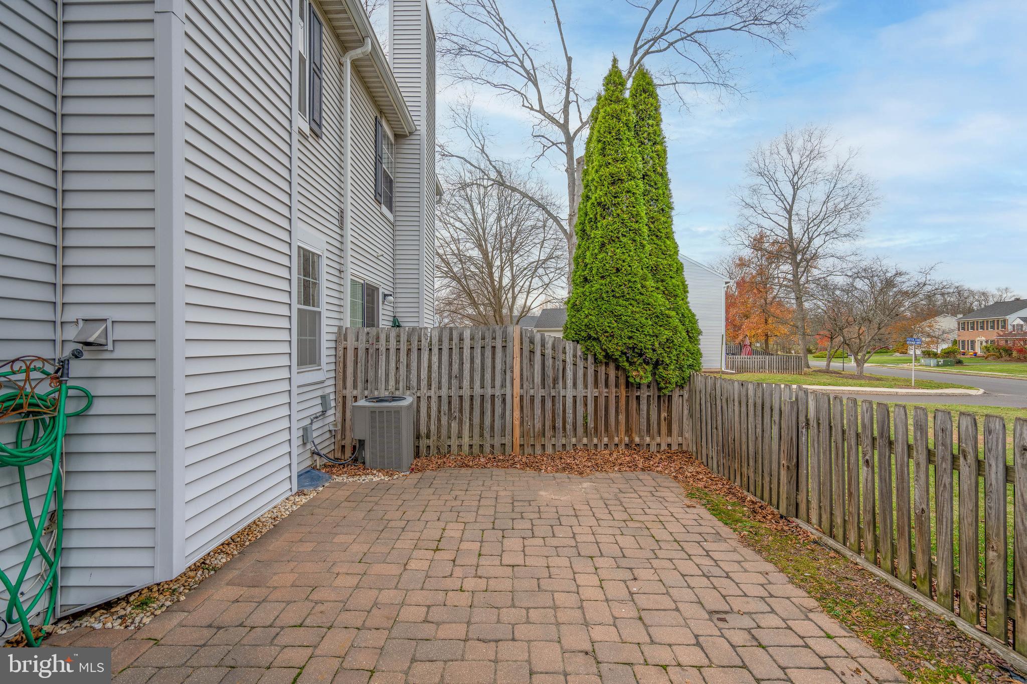 2420 Dogleg Drive Warrington, PA 18976 - Photo 26 of 28 a side view of a house with a garden