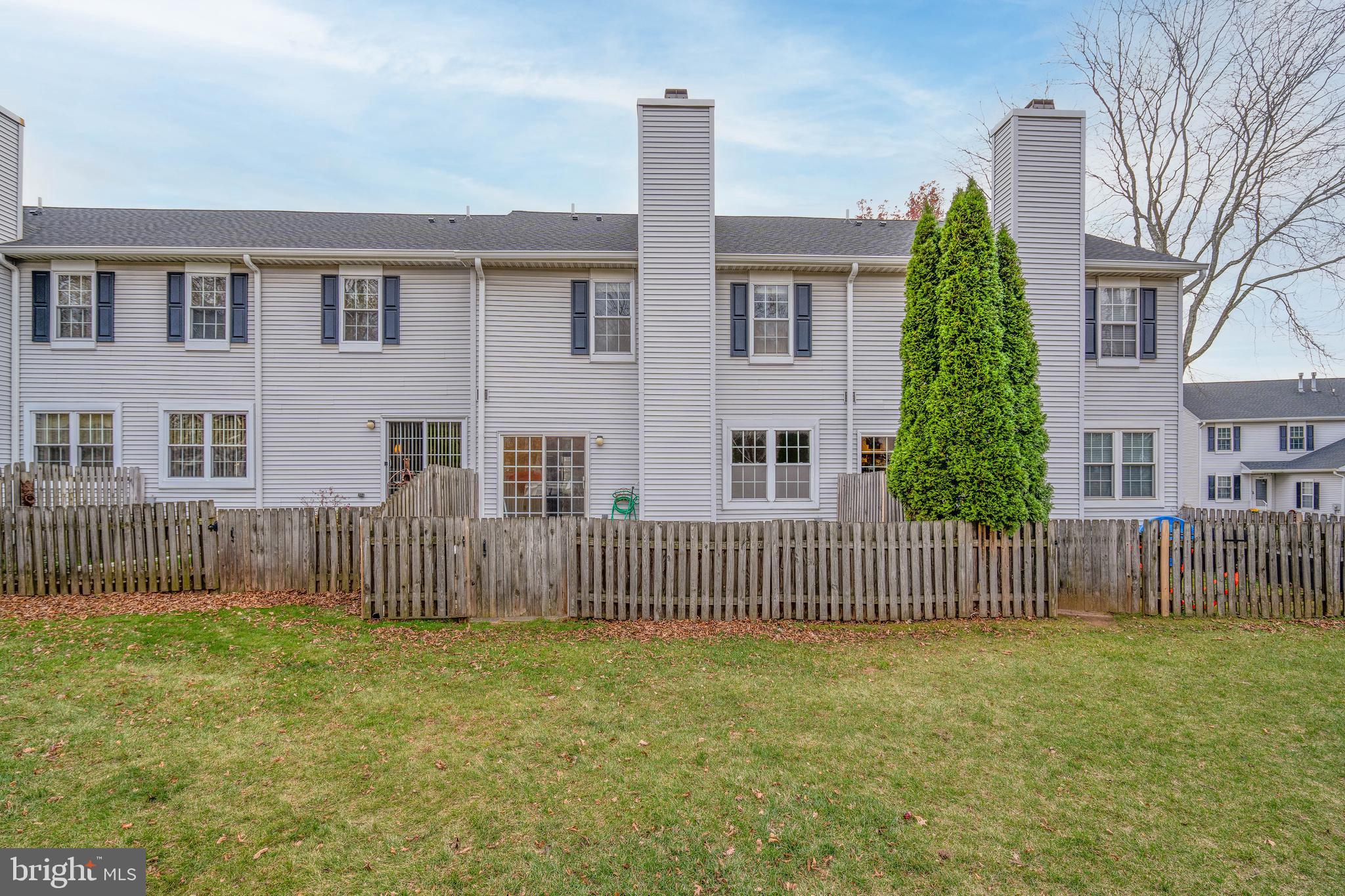 2420 Dogleg Drive Warrington, PA 18976 - Photo 28 of 28 a front view of a house with garden
