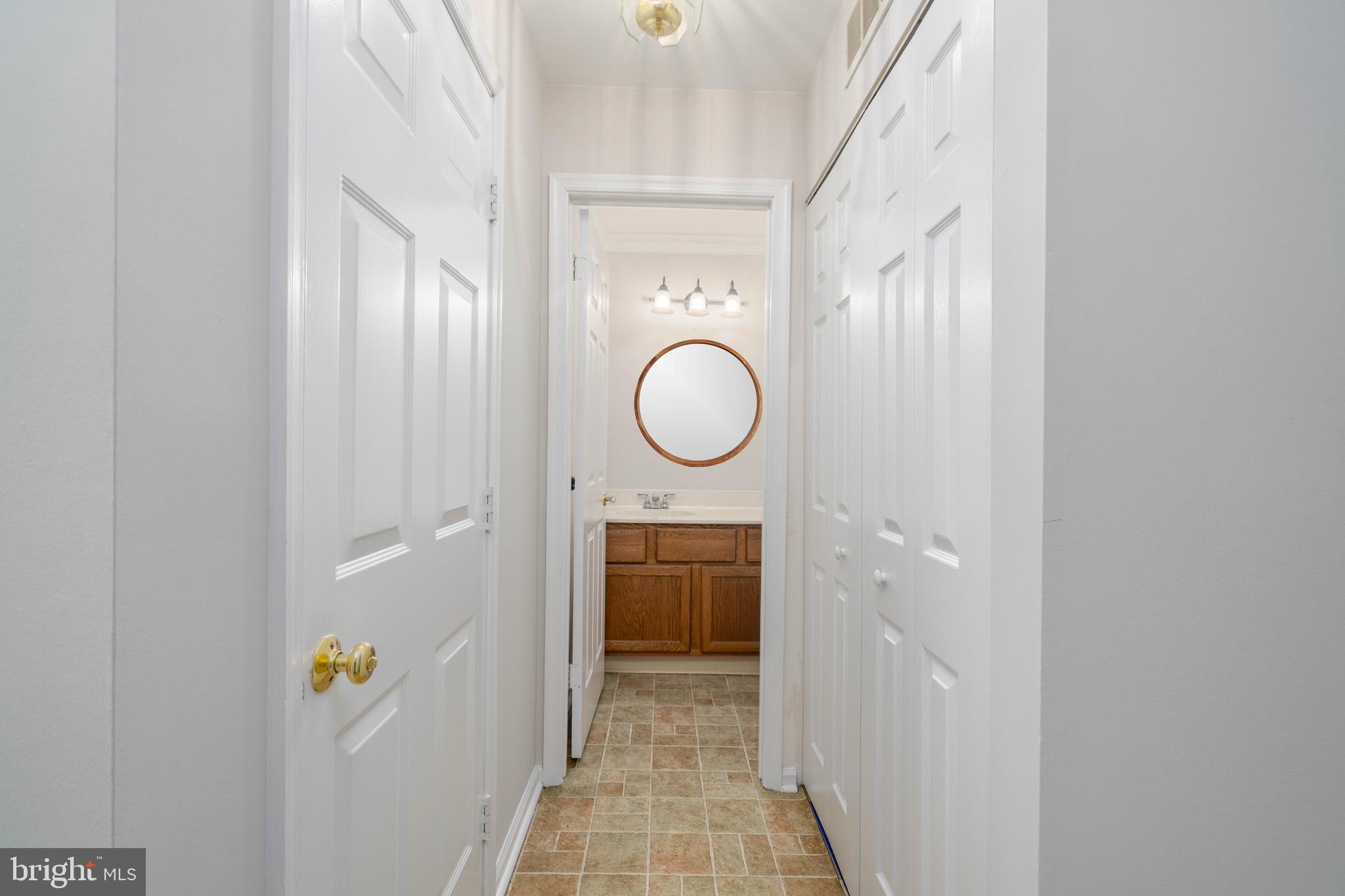 2420 Dogleg Drive Warrington, PA 18976 - Photo 10 of 28 a bathroom with a shower and a mirror