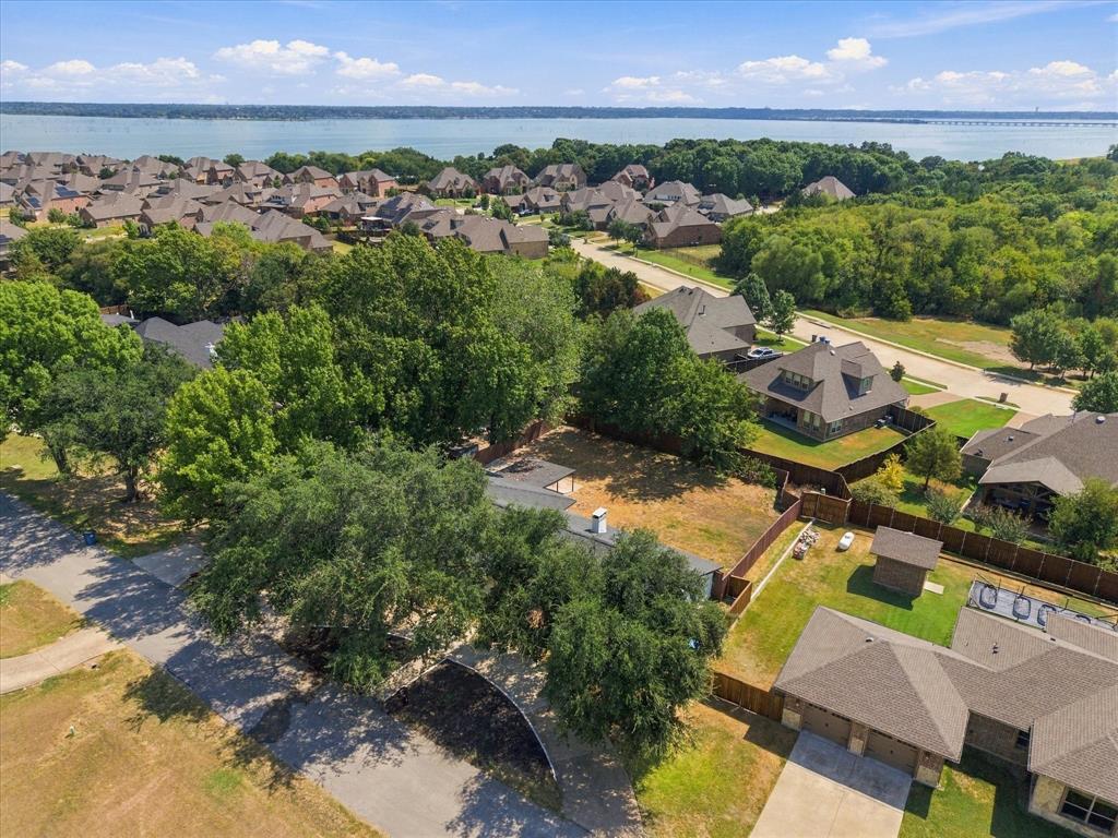 925 Lake North Road Rowlett, TX 75089 - Photo 34 of 37 Aerial perspective of a residential neighborhood with a large body of water in the background