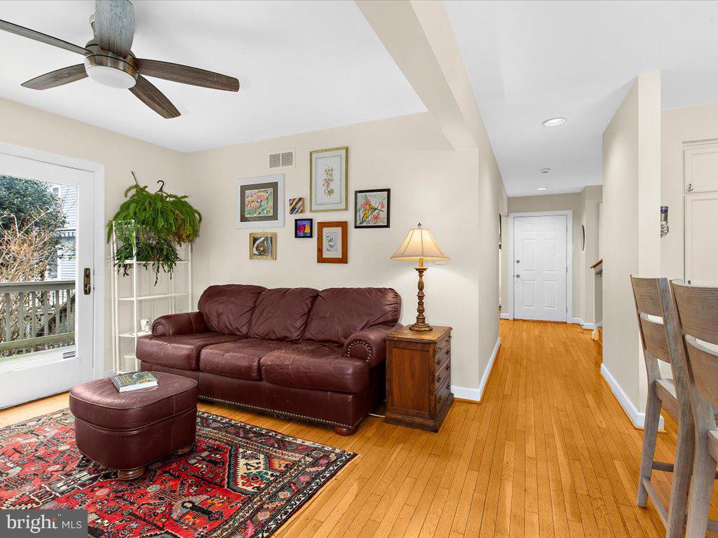 1560 Ritchie Lane Annapolis, MD 21401 - Photo 14 of 54 a living room with furniture and a rug