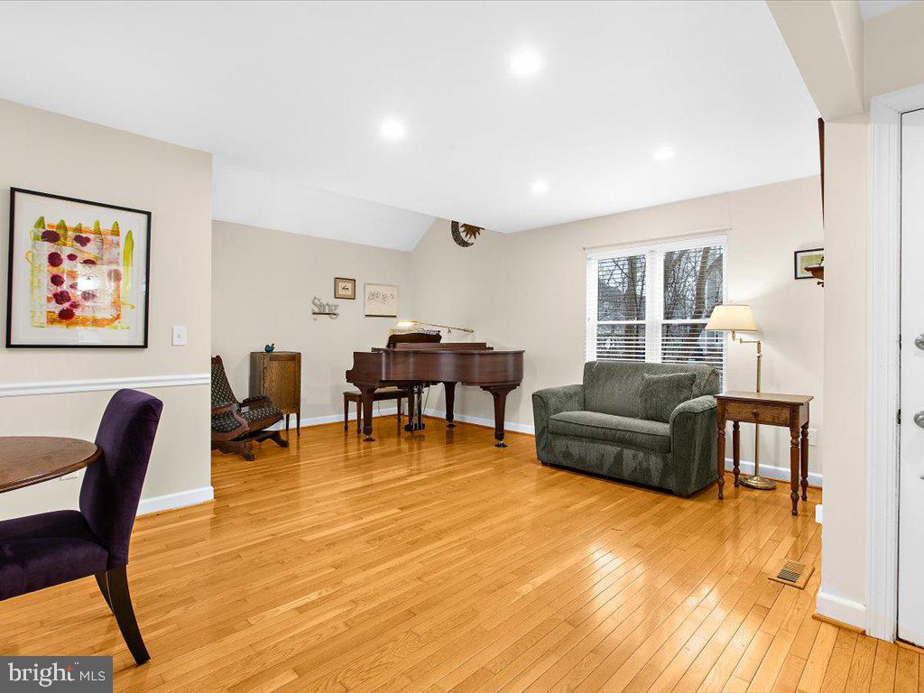 1560 Ritchie Lane Annapolis, MD 21401 - Photo 17 of 54 a living room with furniture and a wooden floor