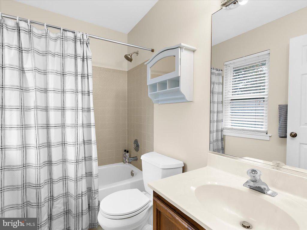 1560 Ritchie Lane Annapolis, MD 21401 - Photo 28 of 54 a bathroom with a sink toilet and shower