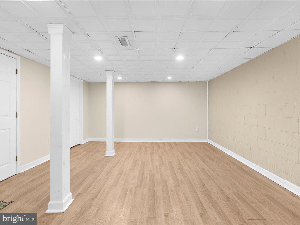 1560 Ritchie Lane Annapolis, MD 21401 - Photo 38 of 54 a view of an empty room with wooden floor