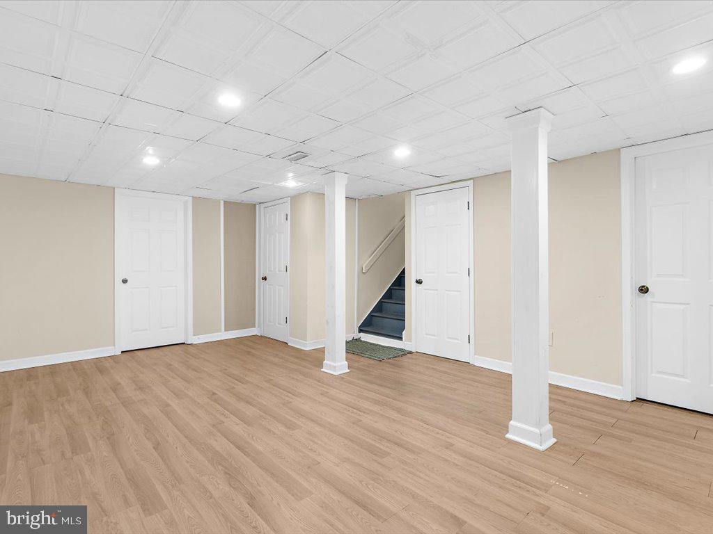 1560 Ritchie Lane Annapolis, MD 21401 - Photo 40 of 54 a view of an empty room with wooden floor