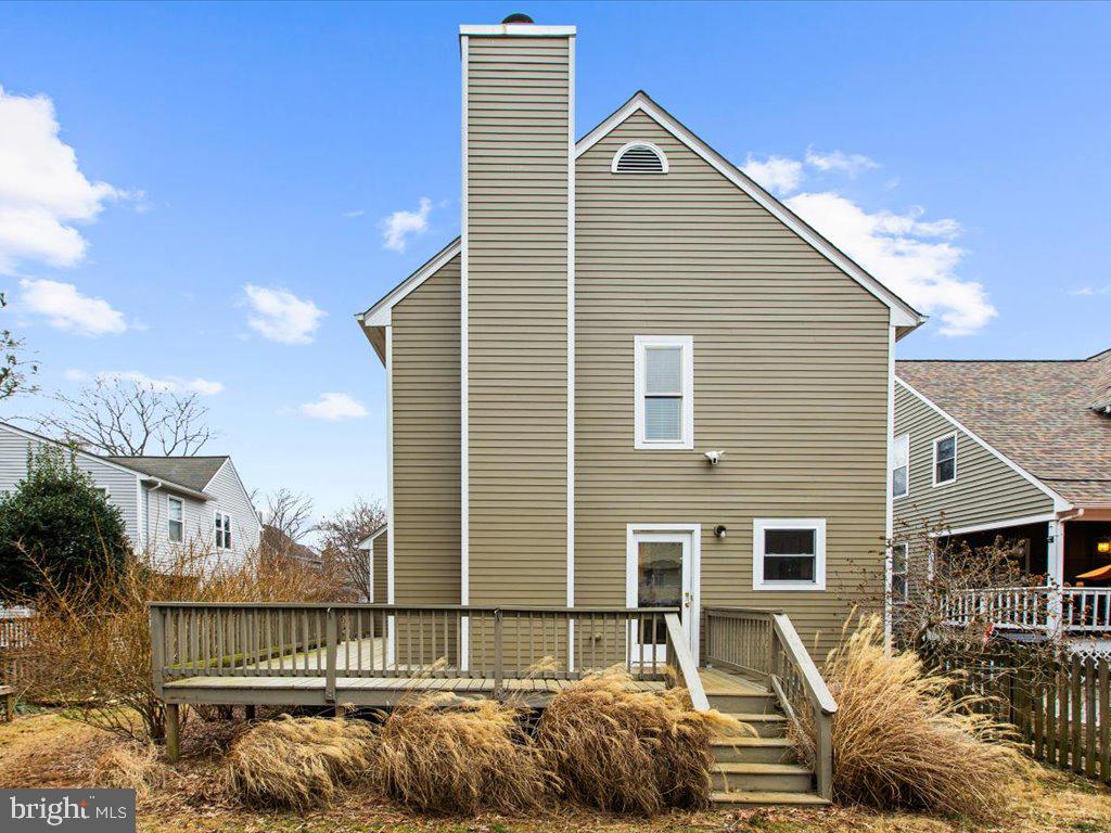 1560 Ritchie Lane Annapolis, MD 21401 - Photo 44 of 54 a front view of a house with a yard