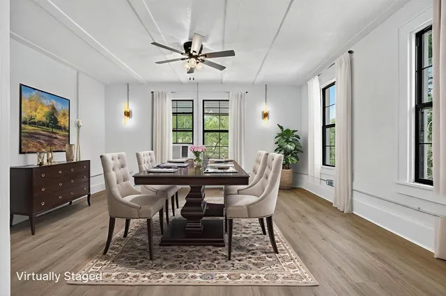 a view of a dining room with furniture
