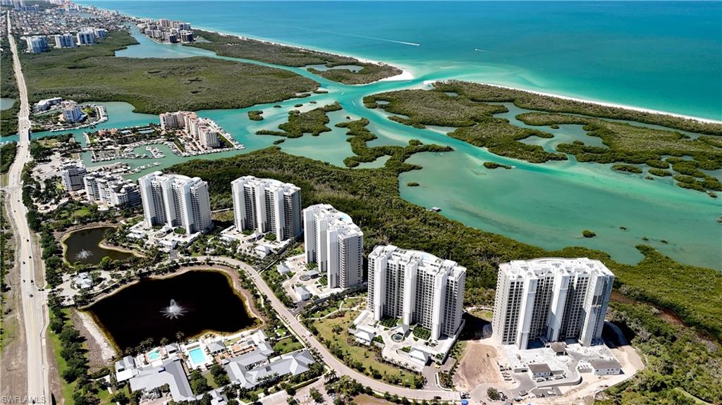 13915 Old Coast Road, Unit 302 Naples, FL 34110 - Photo 39 of 40 a view of a lake with a mountain